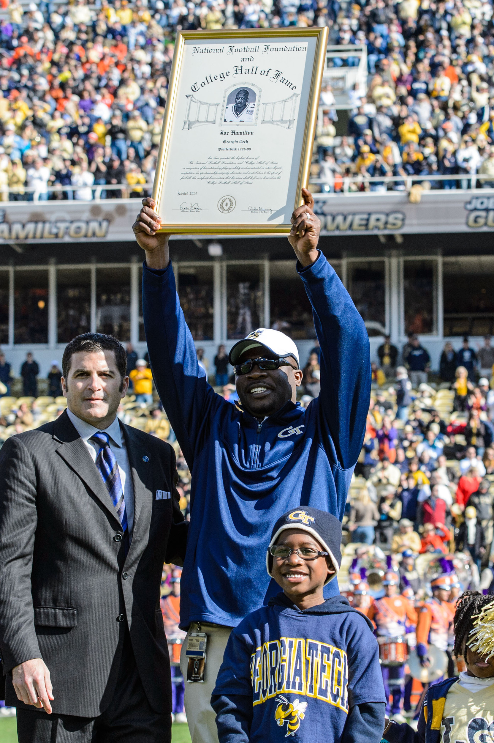 Joe Hamilton is presented with his official Hall of Fame Plaque