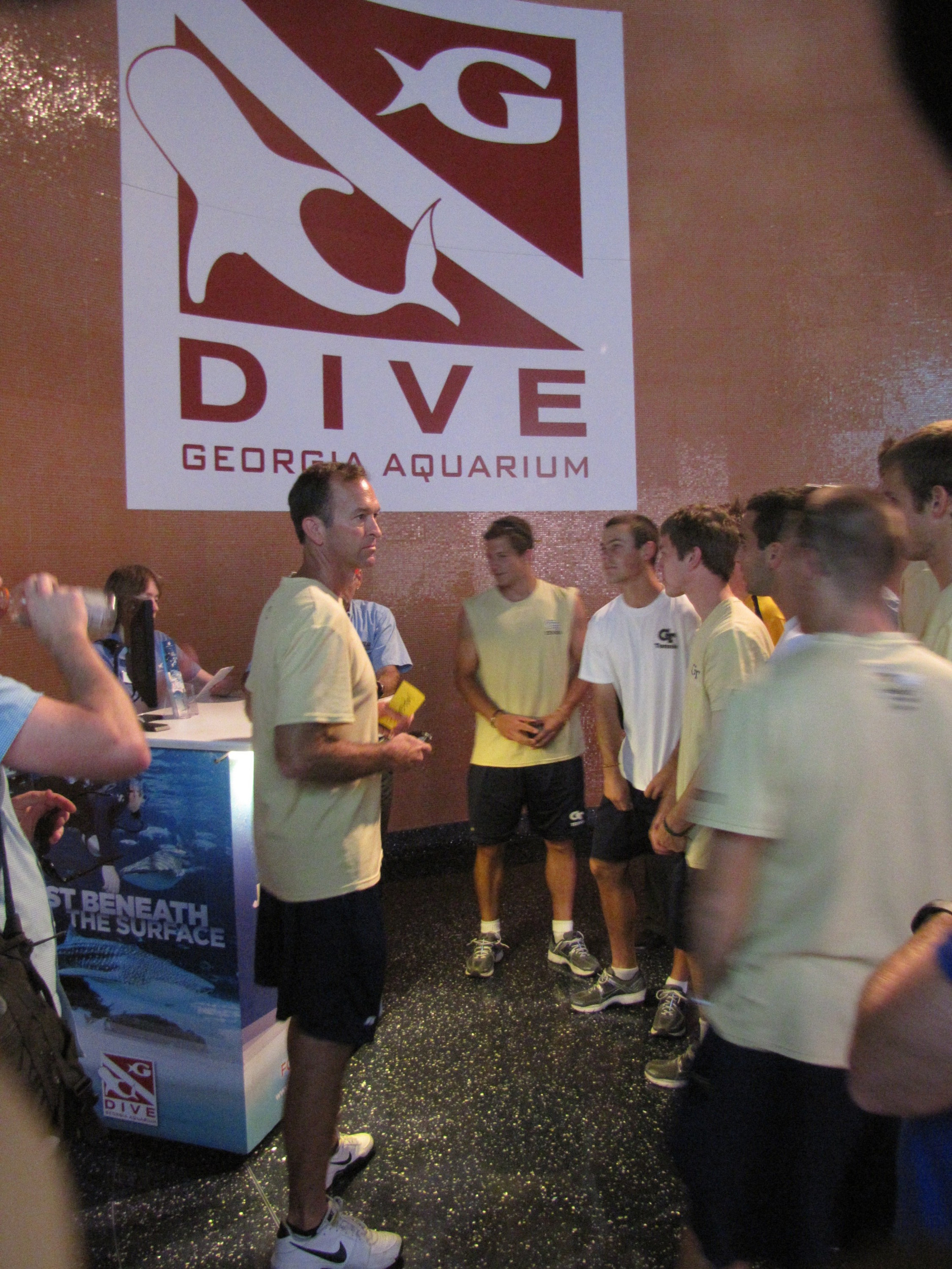 The Georgia Tech Men's Tennis team finds out that they are at the aquarium to swim with sharks