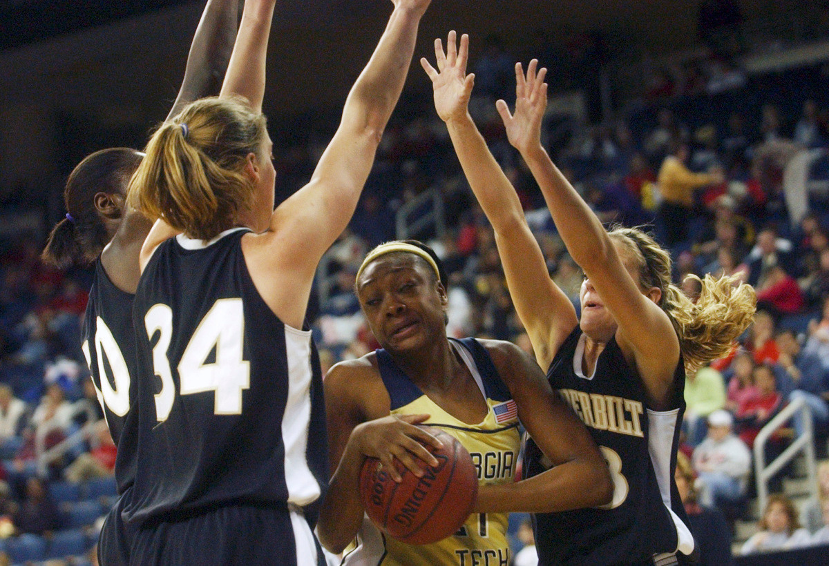 Georgia Tech's Janie Mitchell is surrounded at the net by a host of Vanderbilt players during the first half of a basketball game Sunday, Jan 21, 2007, in Duluth, Ga. (AP Photo/Atlanta Journal-Constitution, Elissa Eubanks)