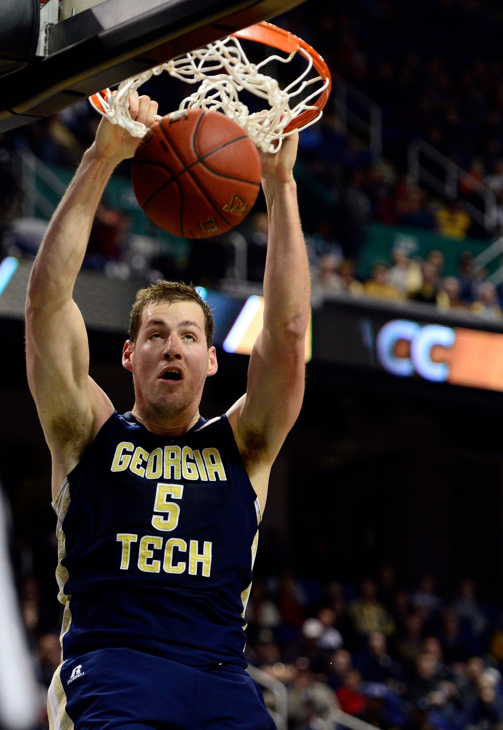 Mar 13, 2014; Greensboro, NC, USA; Georgia Tech Yellow Jackets center Daniel Miller (5) goes up to dunk the ball against the Clemson Tigers in the second round of the ACC college basketball tournament at Greensboro Coliseum. Mandatory Credit: John David Mercer-USA TODAY Sports
