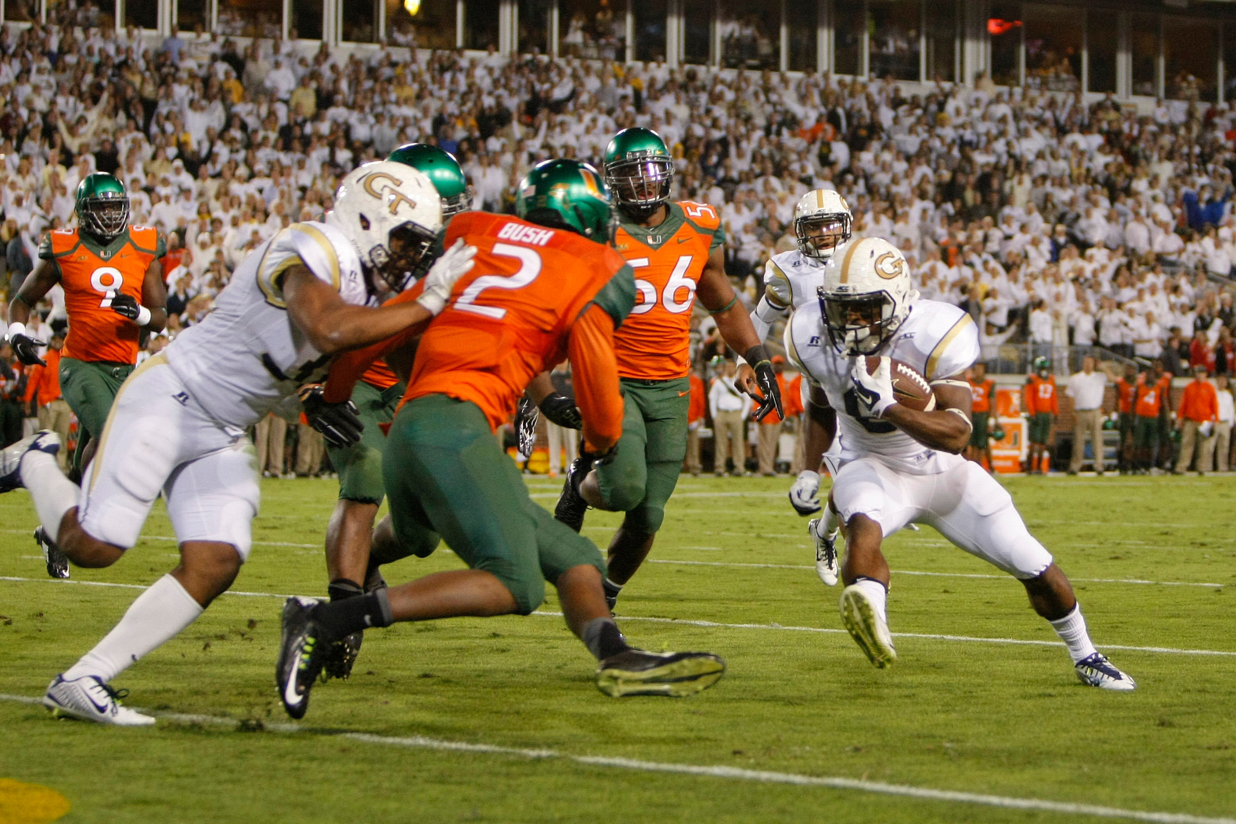 Oct 4, 2014; Atlanta, GA, USA; Yellow Jackets running back Tony Zenon (9) runs the ball for a touchdown in the second quarter. Brett Davis-USA TODAY Sports