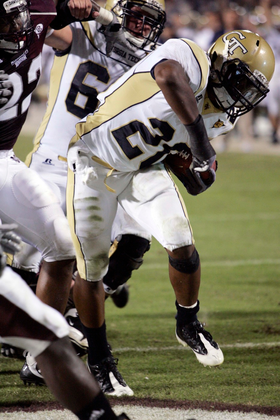 Georgia Tech back Roddy Jones (20) stumbles into the end zone for a second quarter five-yard touchdown run against Mississippi State. (AP)