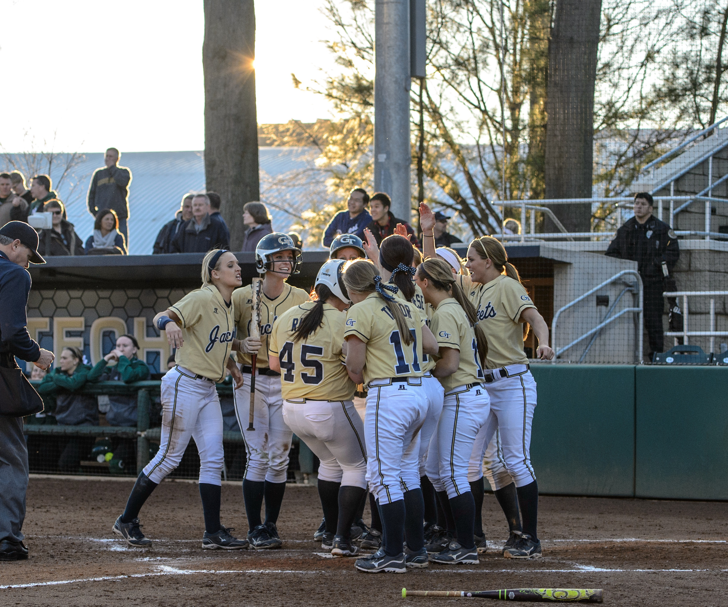 The team celebrates Hope Rush's home run.