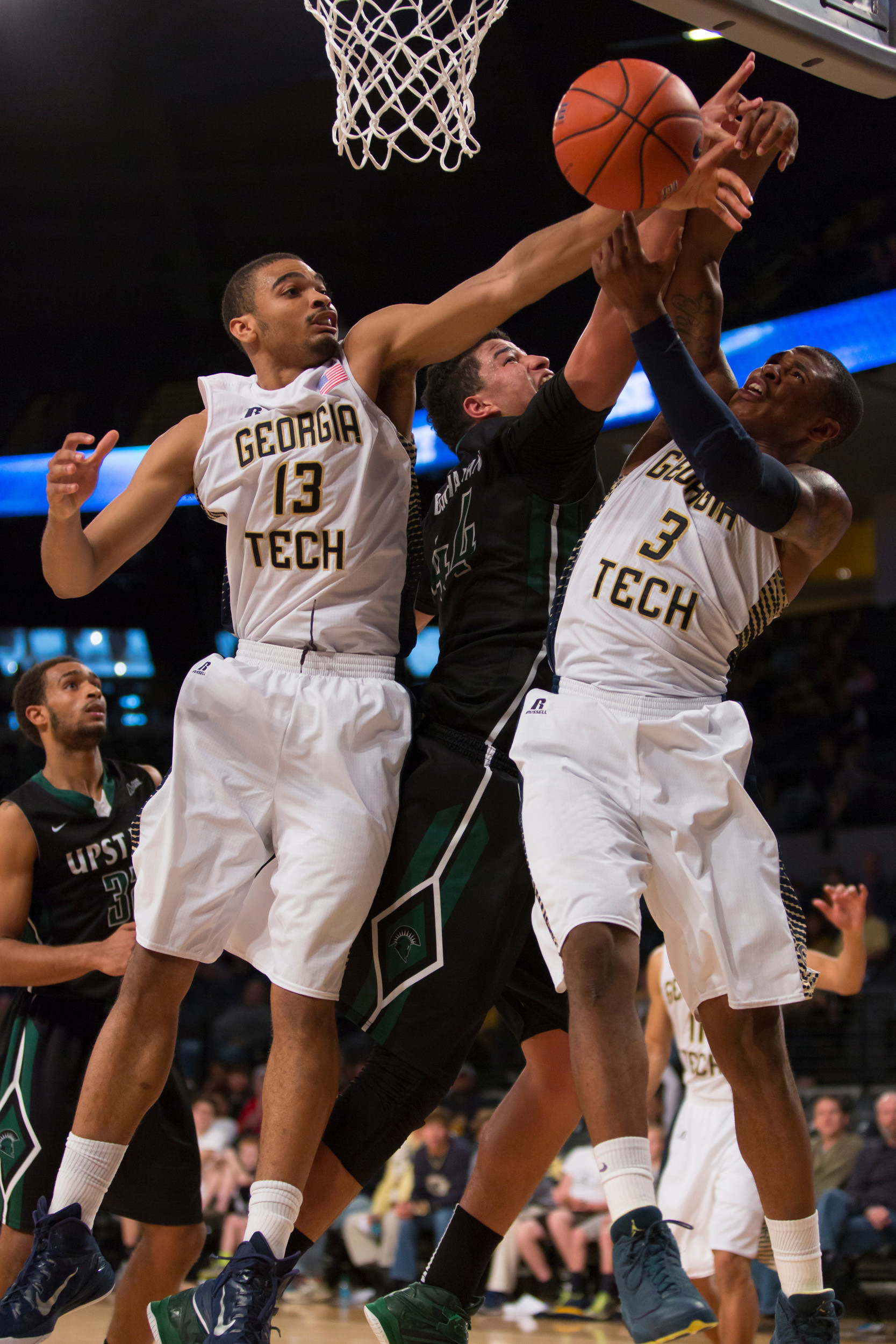 Robert Sampson and Marcus Georges-Hunt battle for a rebound vs. USC Upstate, December 6, 2014, McCamish Pavilion