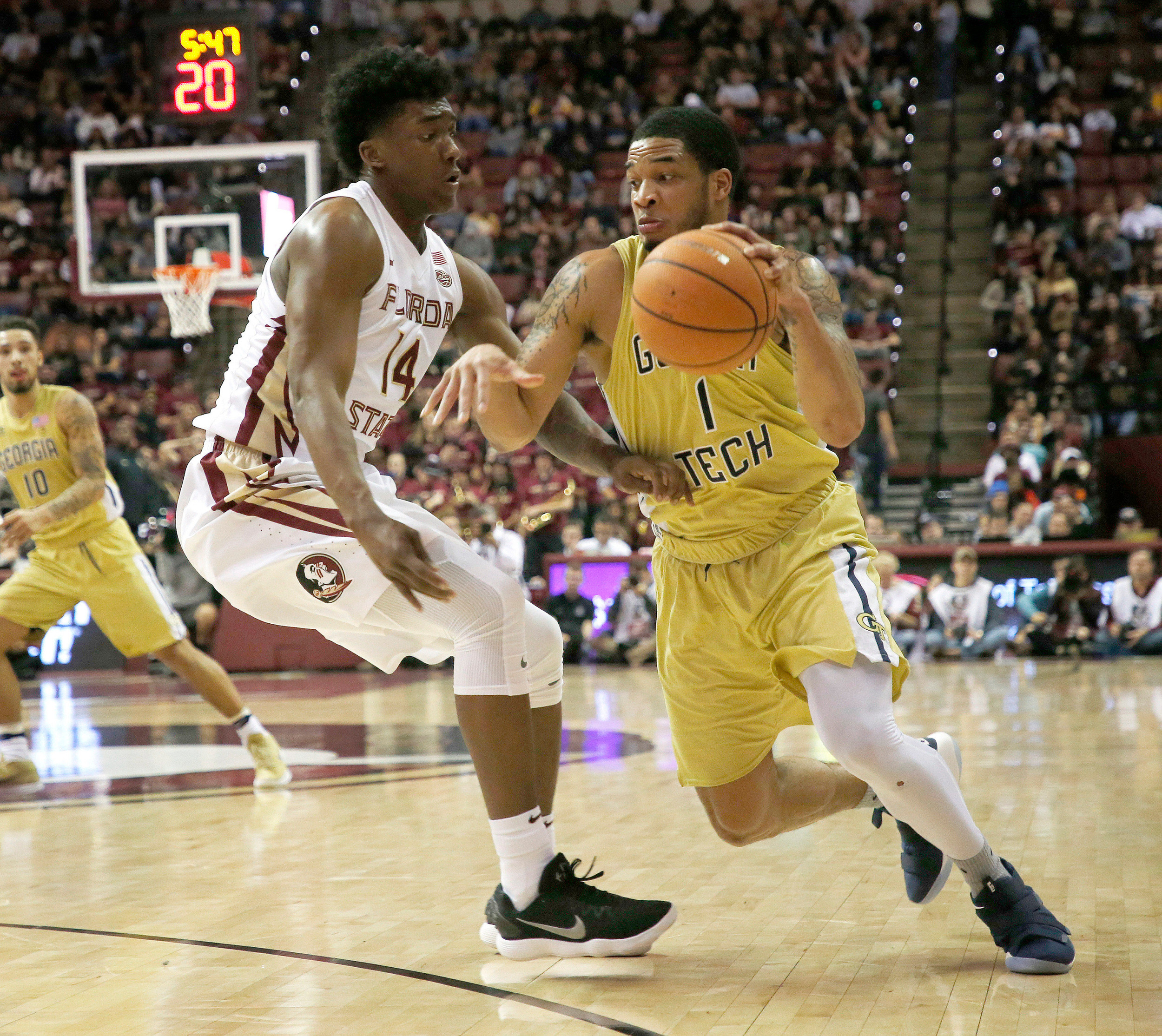 Jan 24, 2018; Tallahassee, FL, USA; Georgia Tech Yellow Jackets guard Tadric Jackson (1) drives against Florida State Seminoles guard Terance Mann (14) during the first half of play at Donald L. Tucker Center. Mandatory Credit: Glenn Beil-USA TODAY Sports