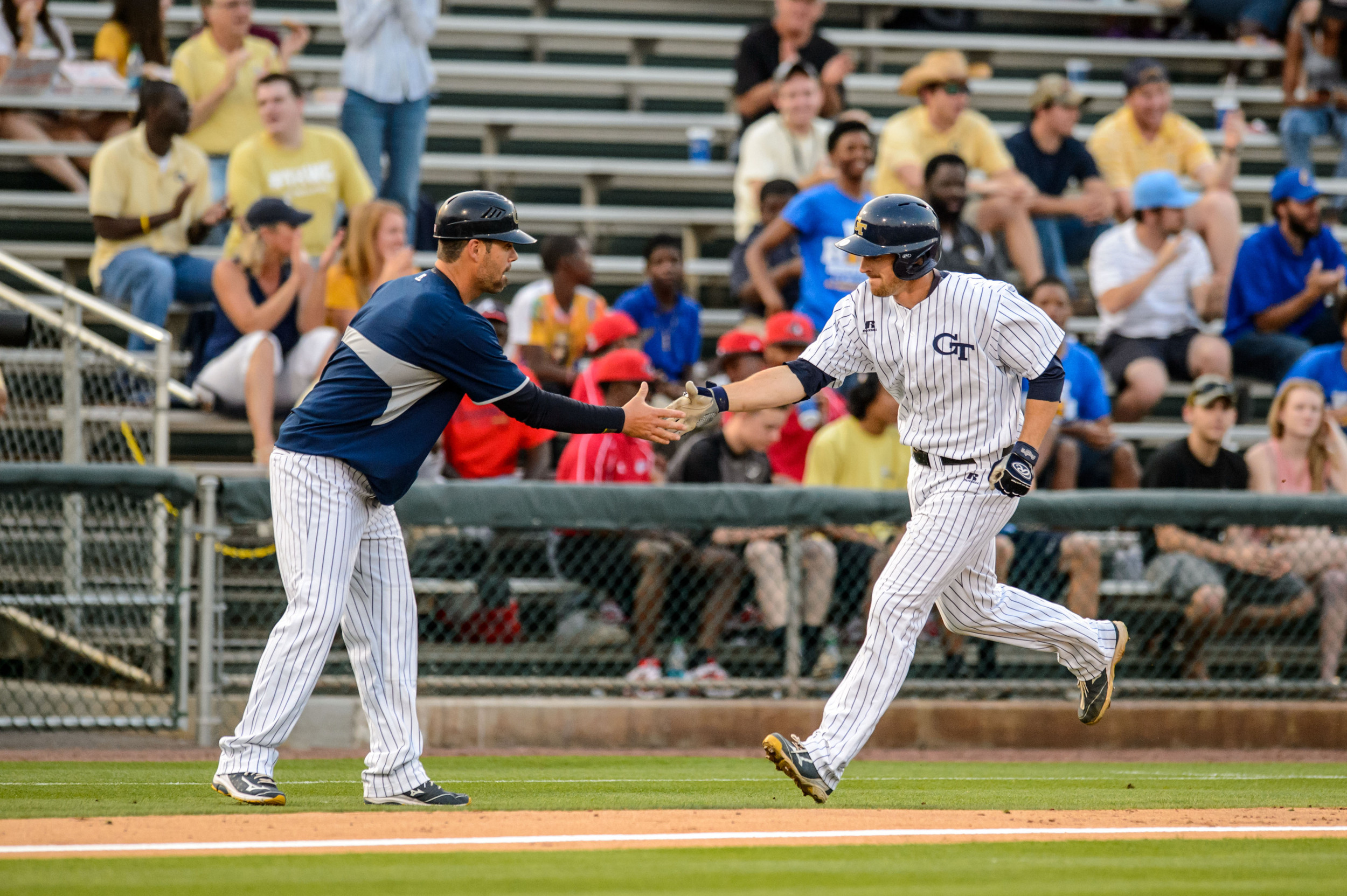 A.J. Murray (9), Assistant Coach Bryan Prince (18)