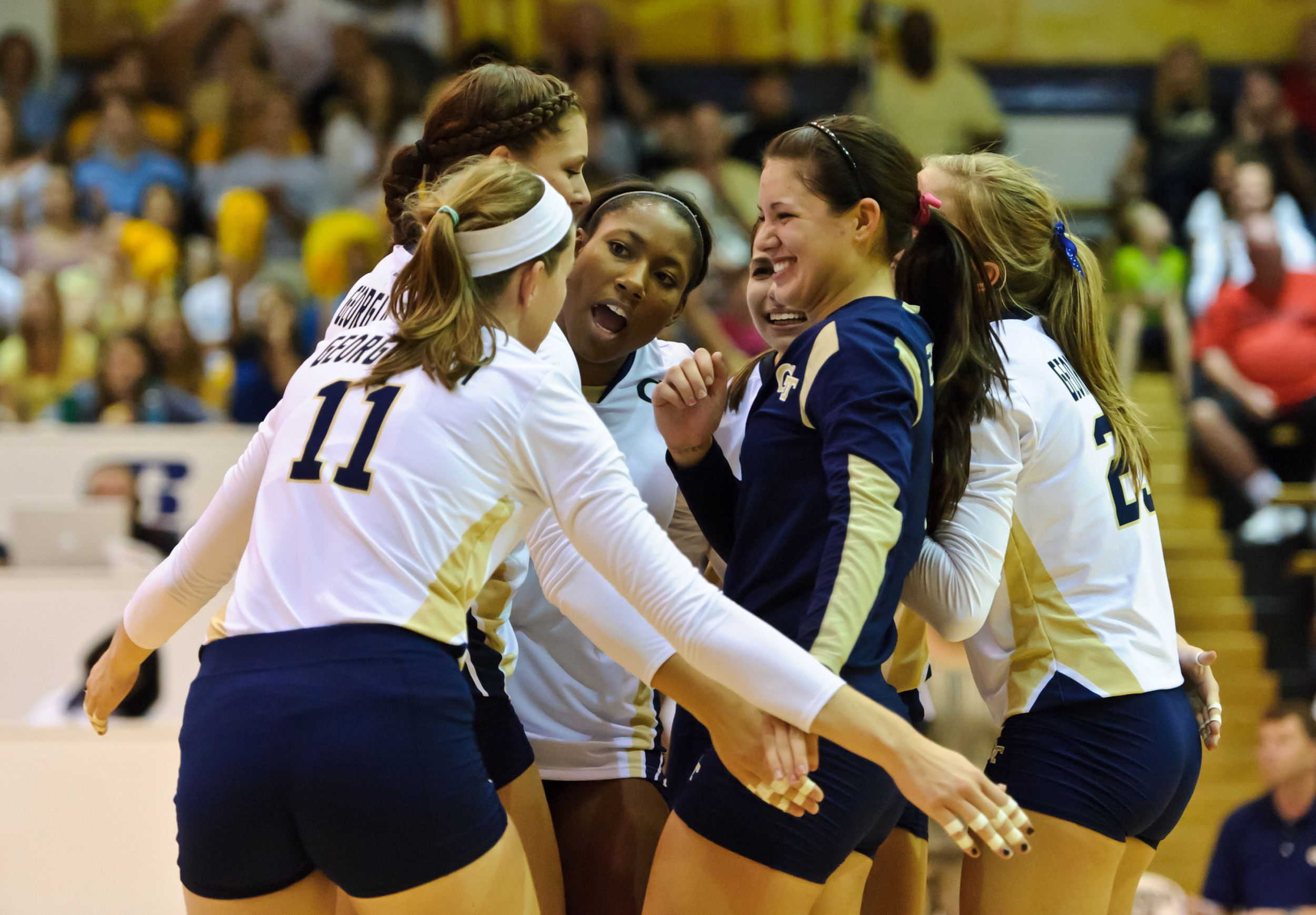 The team celebrates a point. Point Tech!