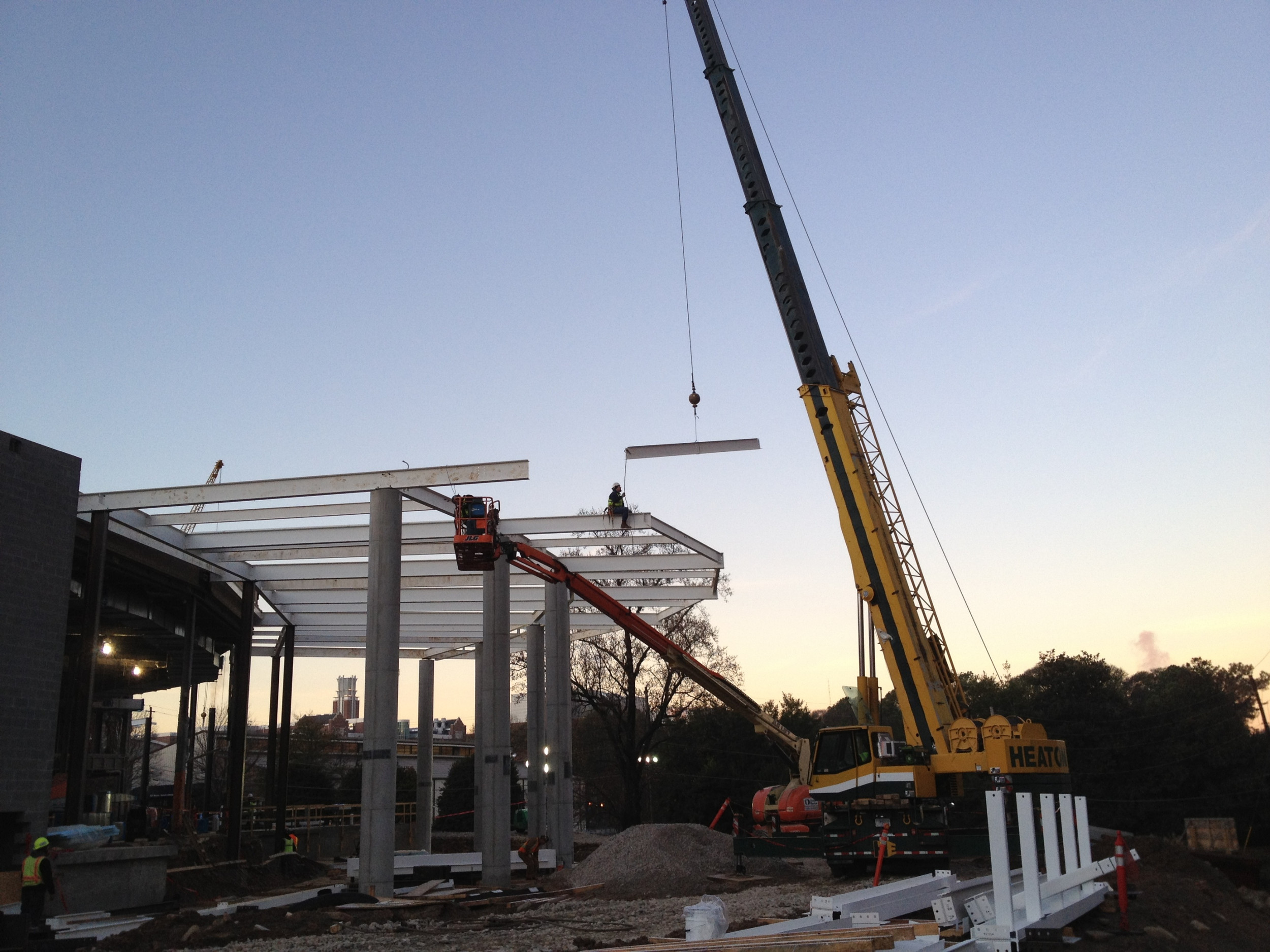 Iron Workers installing steel structure on the exterior of McCamish Pavilion - 12/2/11