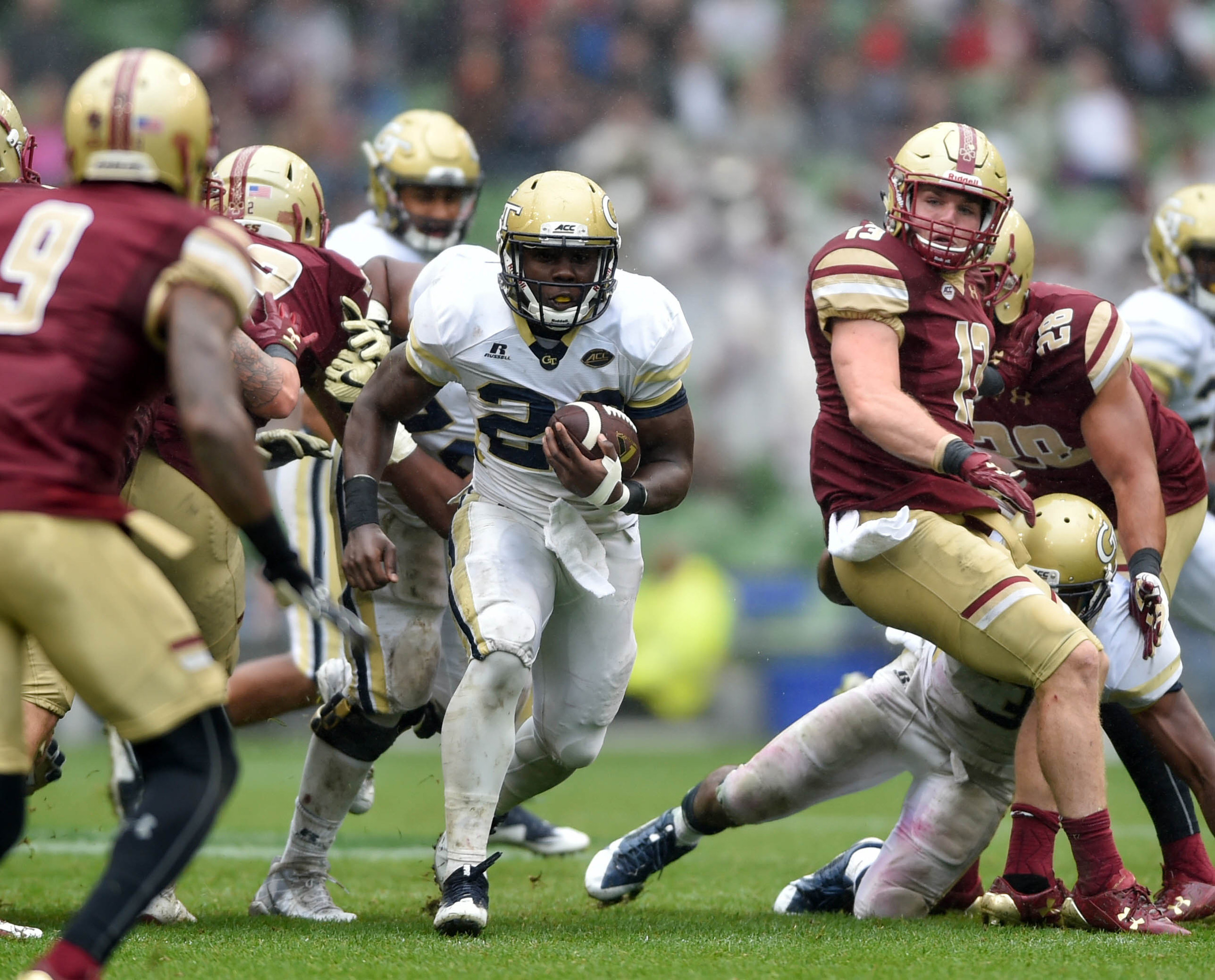 Sep 3, 2016; Dublin, IRL; Georgia Tech Yellow Jackets running back Dedrick Mills (26) runs against the Boston College Eagles at Aviva Stadium. Mandatory Credit: Steve Flynn-USA TODAY Sports