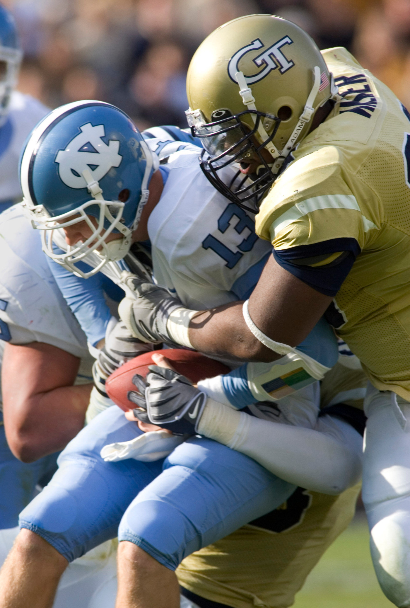 North Carolina quarterback T.J. Yates is sacked by Vance Walker. (AP Photo/John Amis)