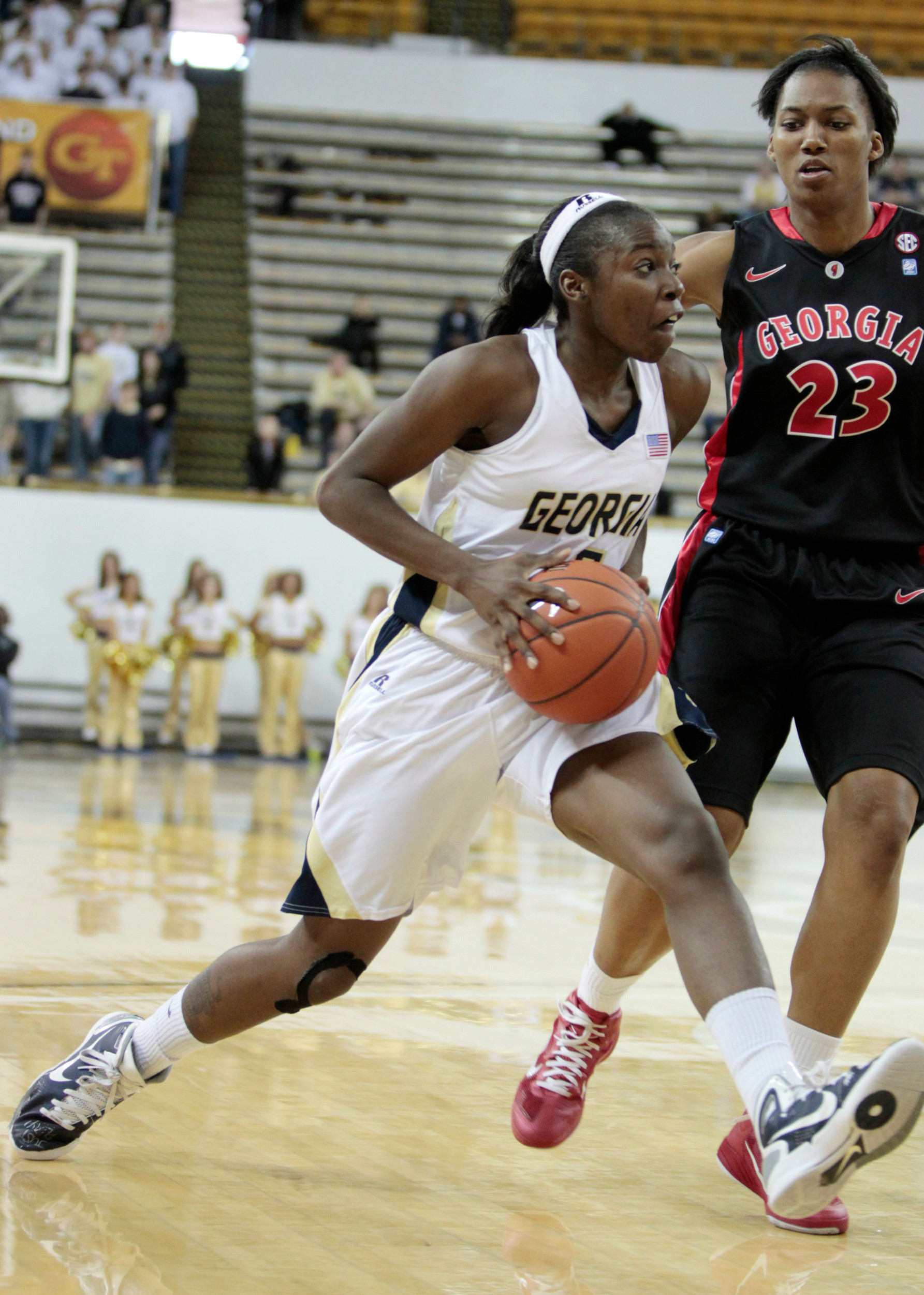 Georgia Tech guard Tyaunna Marshall (15) drives against Georgia forward Tamika Willis (23) in the second half of a women's NCAA college basketball game Sunday, Dec. 5 2010 in Atlanta. Marshall scored 20 points to help Tech to a 69-53 win. (AP Photo/John Bazemore)