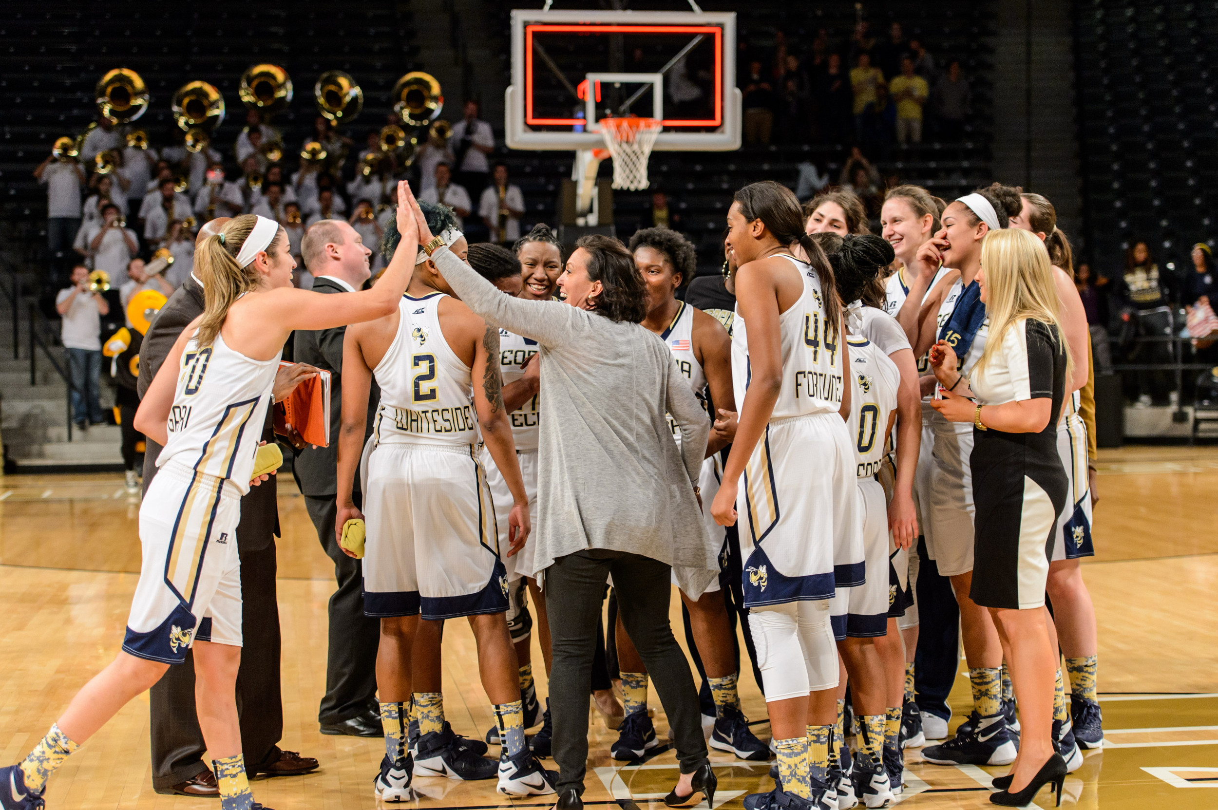 Coach Jo talks to the team after the win