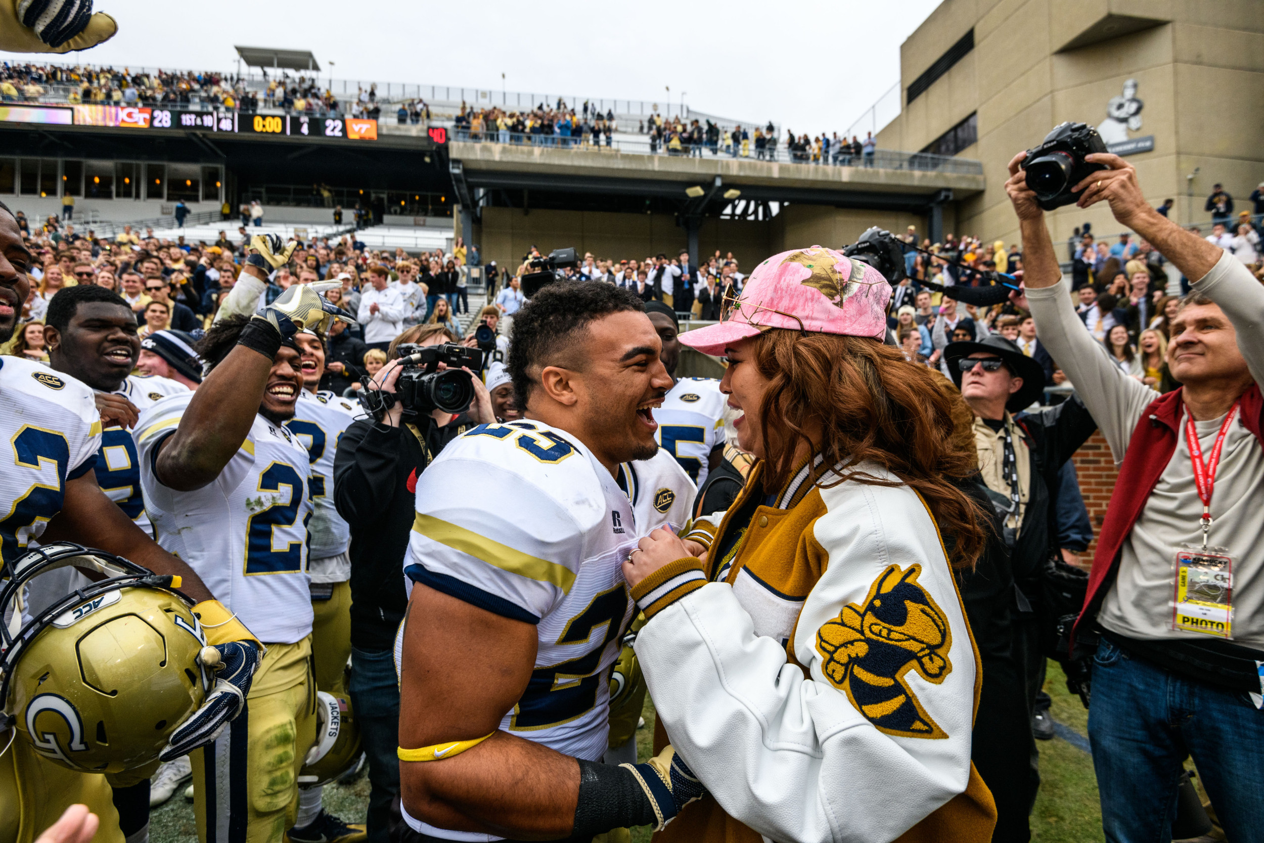 Linebacker Tre' Jackson (25) proposed to his girlfriend, Desiree', after the win. She said yes!