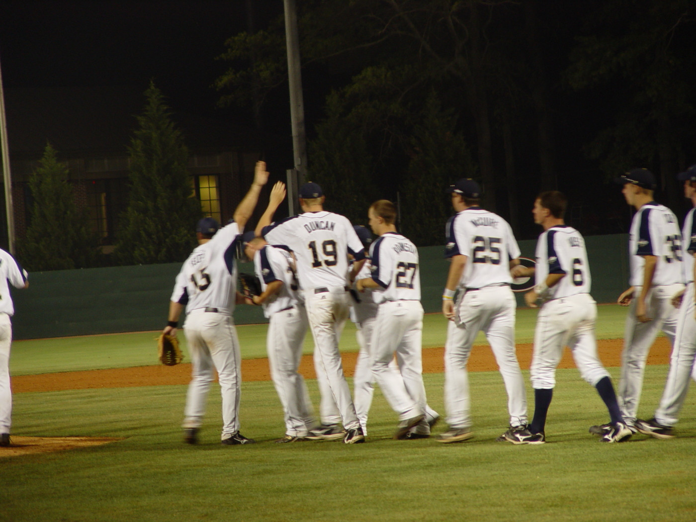 Tech players celebrate their 8-5 win over Louisville in the first round of the NCAA baseball regional, May 30, 2008.