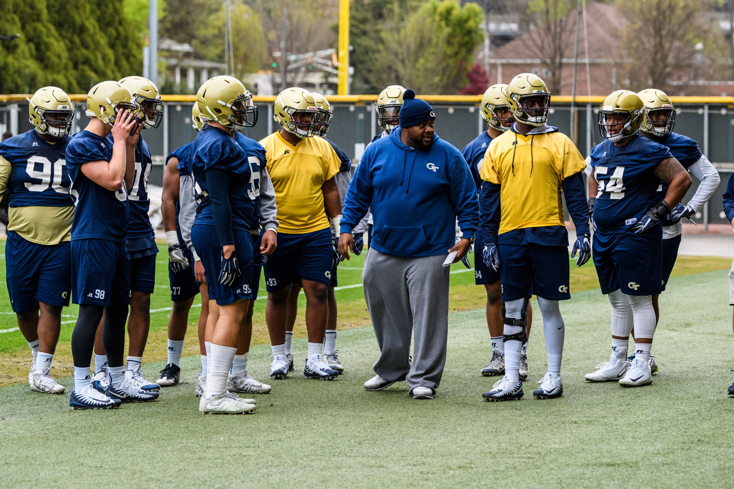 Defensive Line Coach Jerome Riase and the defensive line