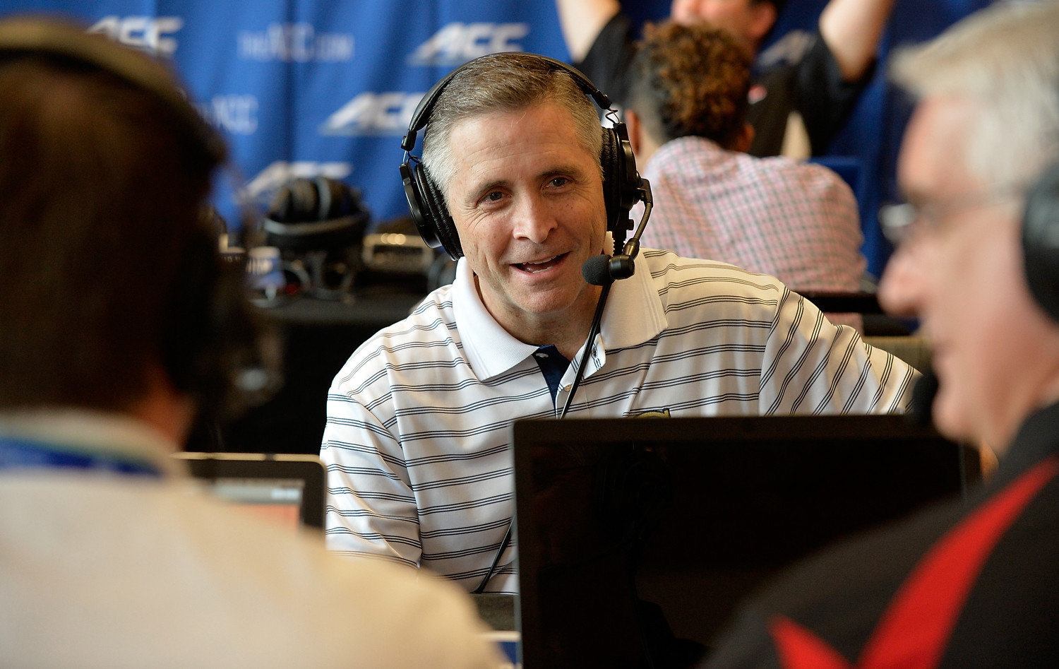 Georgia Tech head coach Brian Gregory is interviewed by a radio network during the ACC Operation Basketball, Wednesday, Oct. 29, 2014 in Charlotte, N.C. #ACCmediaday (Photo by Sara D. Davis, theACC.com)