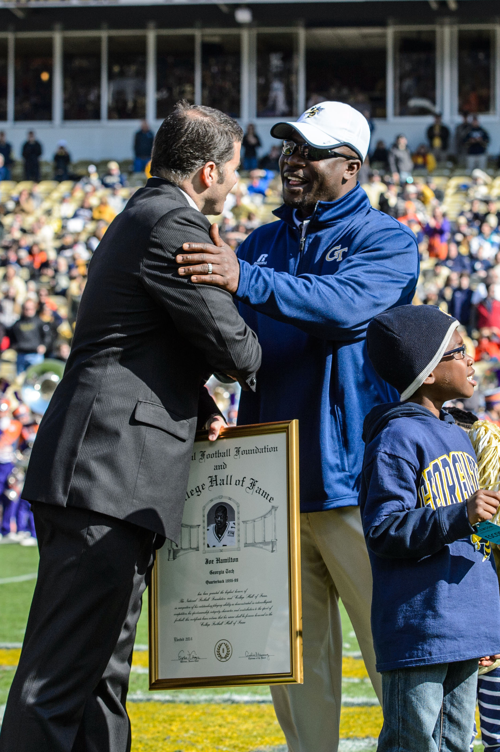 Joe Hamilton is presented with his official Hall of Fame Plaque