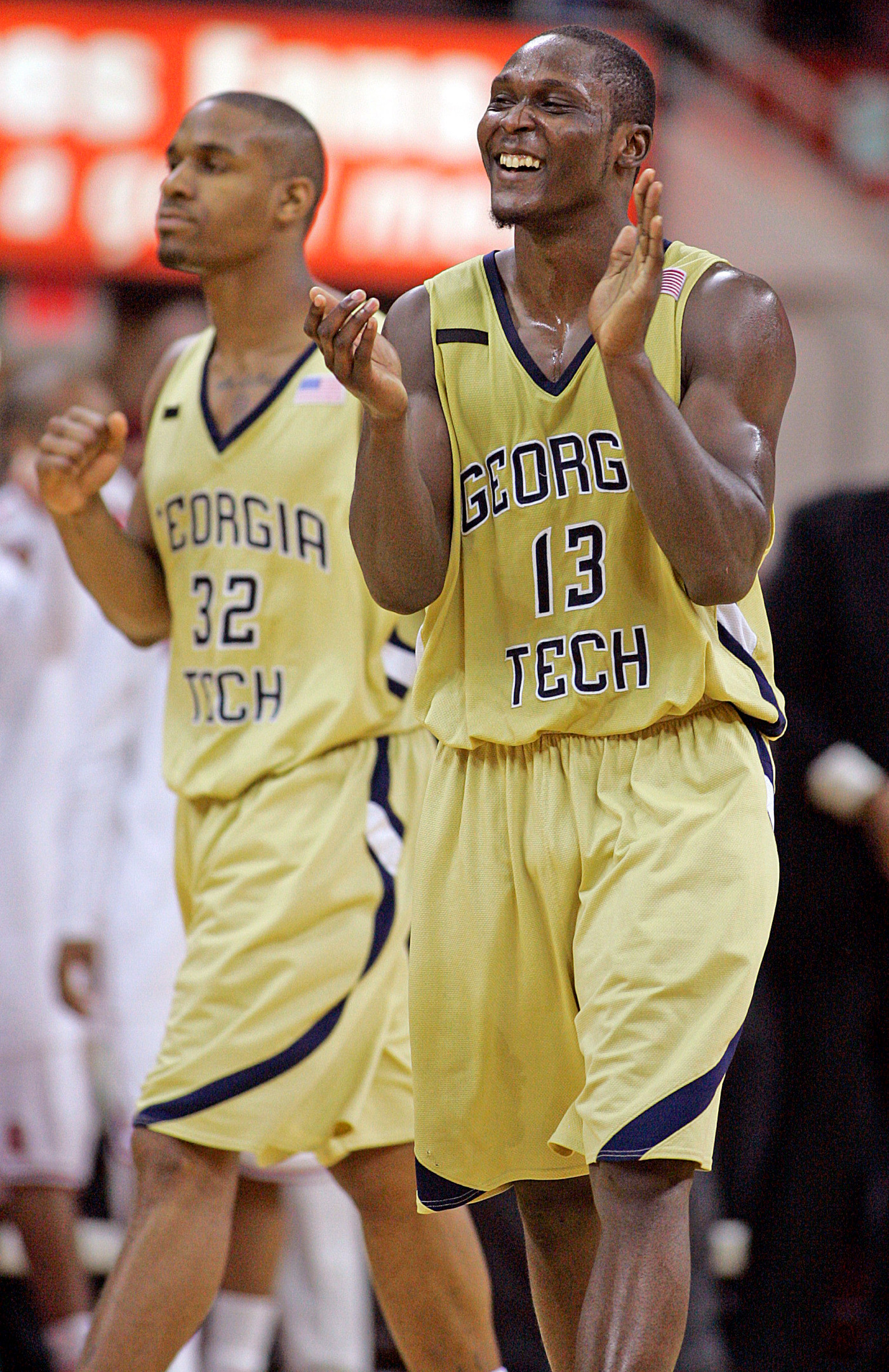 Georgia Tech's D'Andre Bell (13) and Jeremis Smith (32) celebrate following Georgia Tech's 77-74 win over North Carolina State in a basketball game in Raleigh, N.C., Wednesday, Jan. 23, 2008.