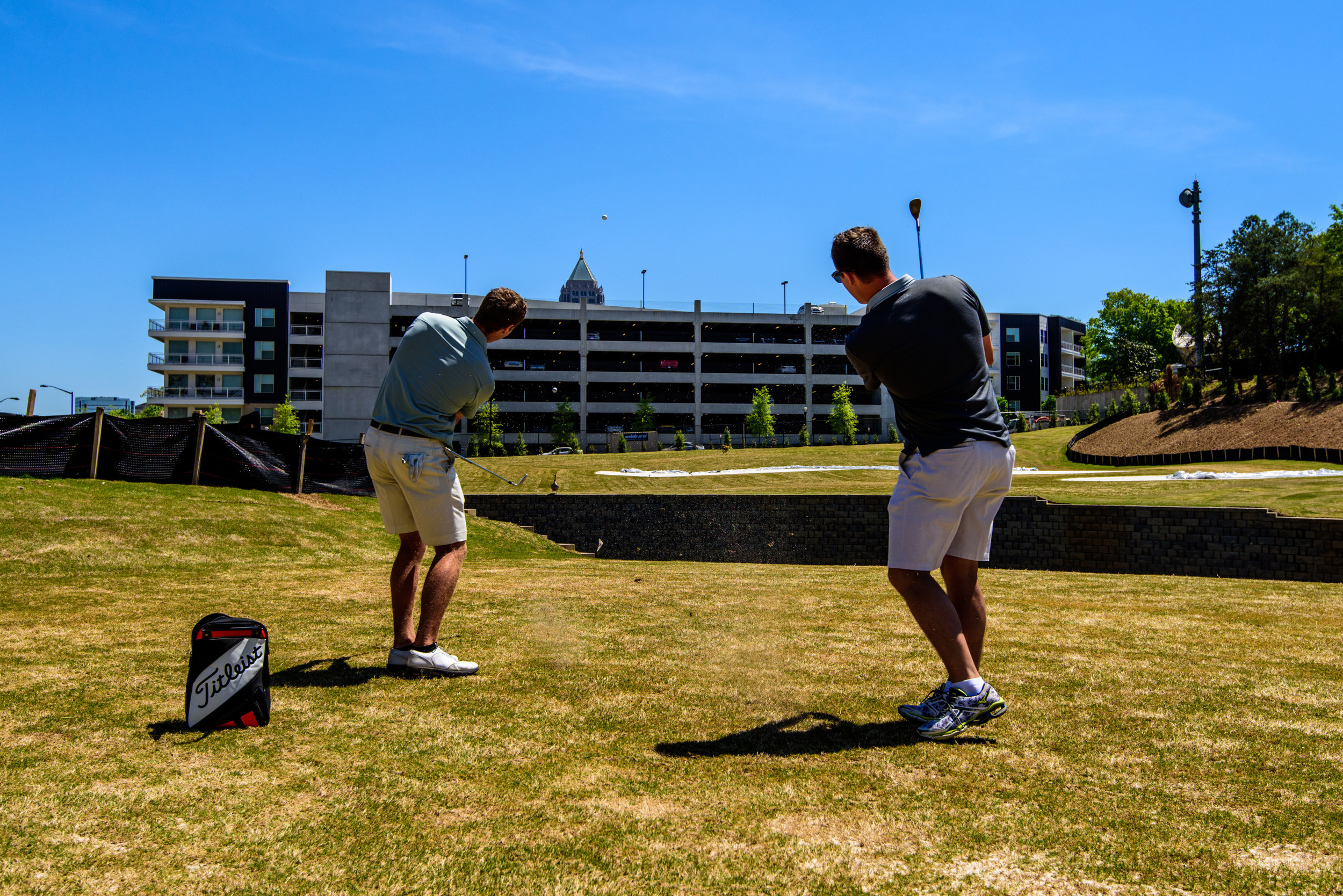 Assistant coach Jeff Pierce and junior Vince Whaley get some practice in on recent afternoon. The Yellow Jackets were able to begin using the Noonan Facility in April.