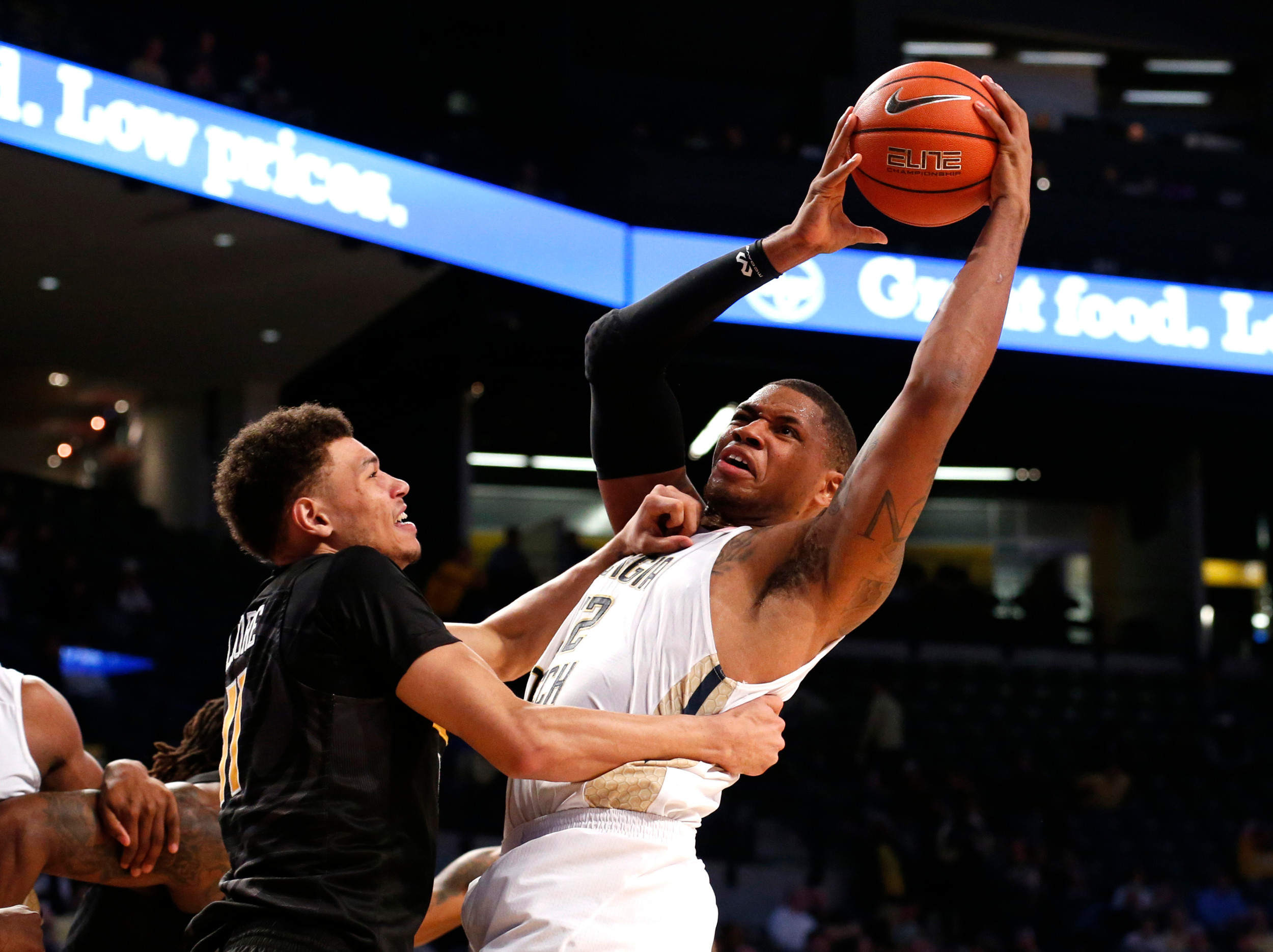 Georgia Tech forward Nick Jacobs grabs a rebound in front of VCU Rams forward Michael Gilmore in the second half of their game at McCamish Pavilion. Credit: Jason Getz-USA TODAY Sports