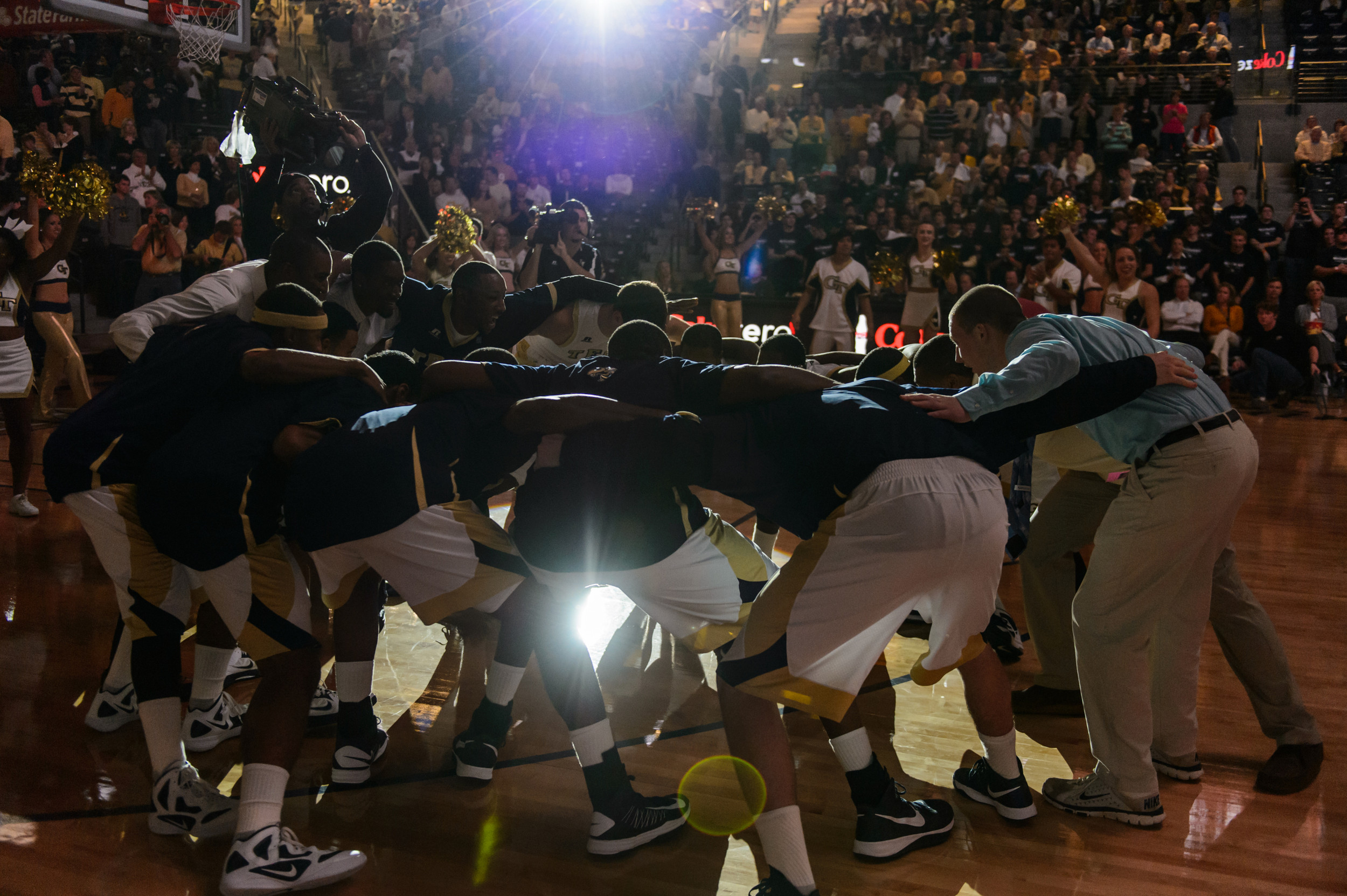 The Yellow Jackets huddle before the game.