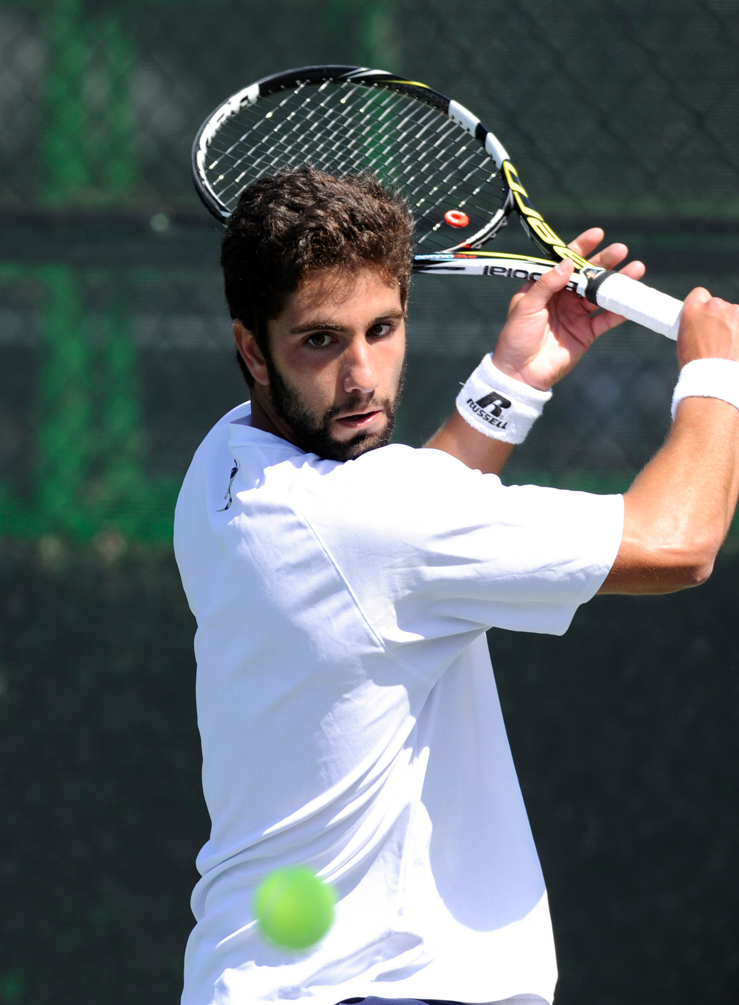 Georgia Tech's Carlos Benito eyes the ball during the 2015 ACC Menâs Tennis Championship match in Cary, N.C., Friday, April 24, 2015. (Photo by Liz Condo, theACC.com)