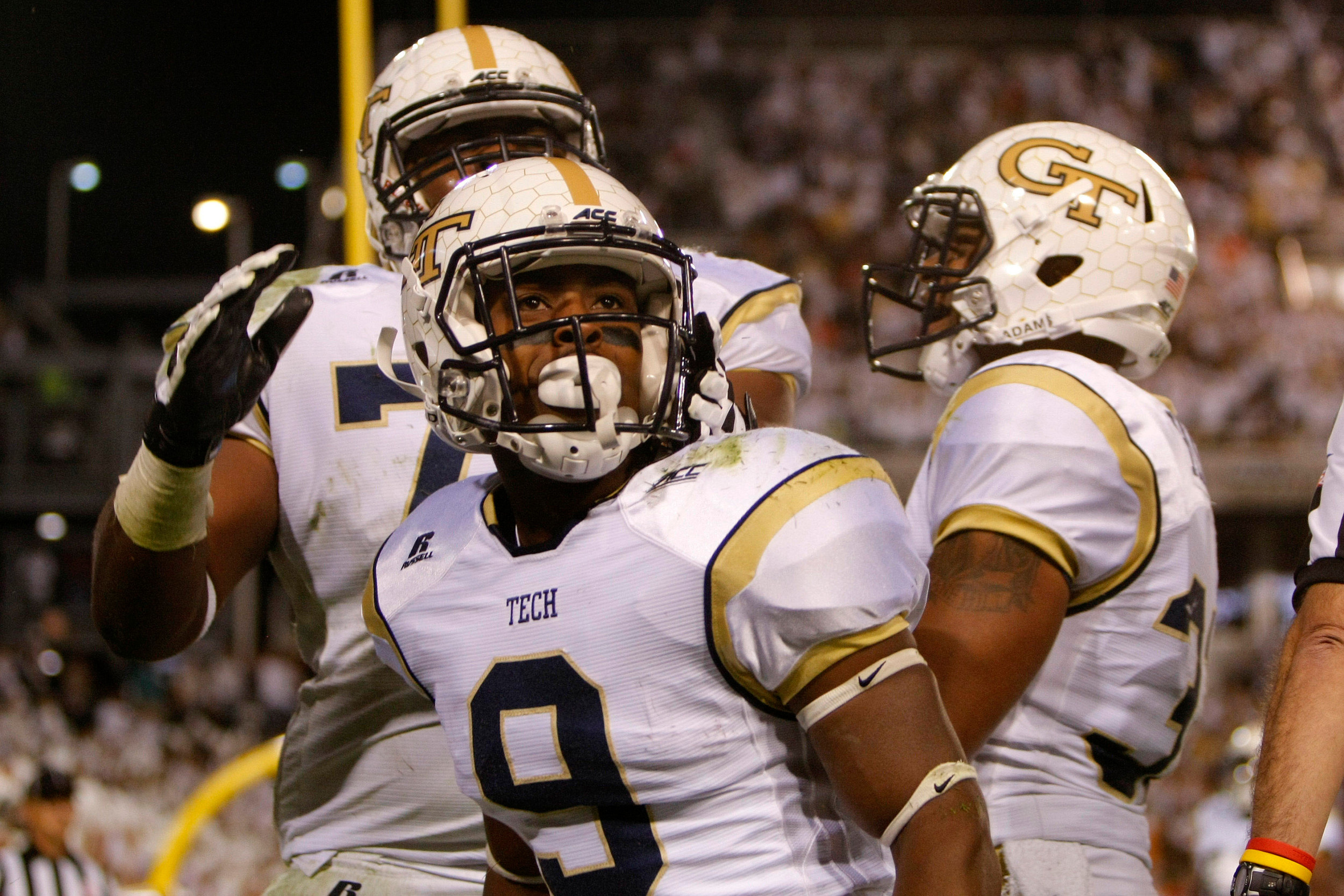 Oct 4, 2014; Atlanta, GA, USA; Yellow Jackets running back Tony Zenon (9) celebrates after a touchdown in the second quarter. Brett Davis-USA TODAY Sports