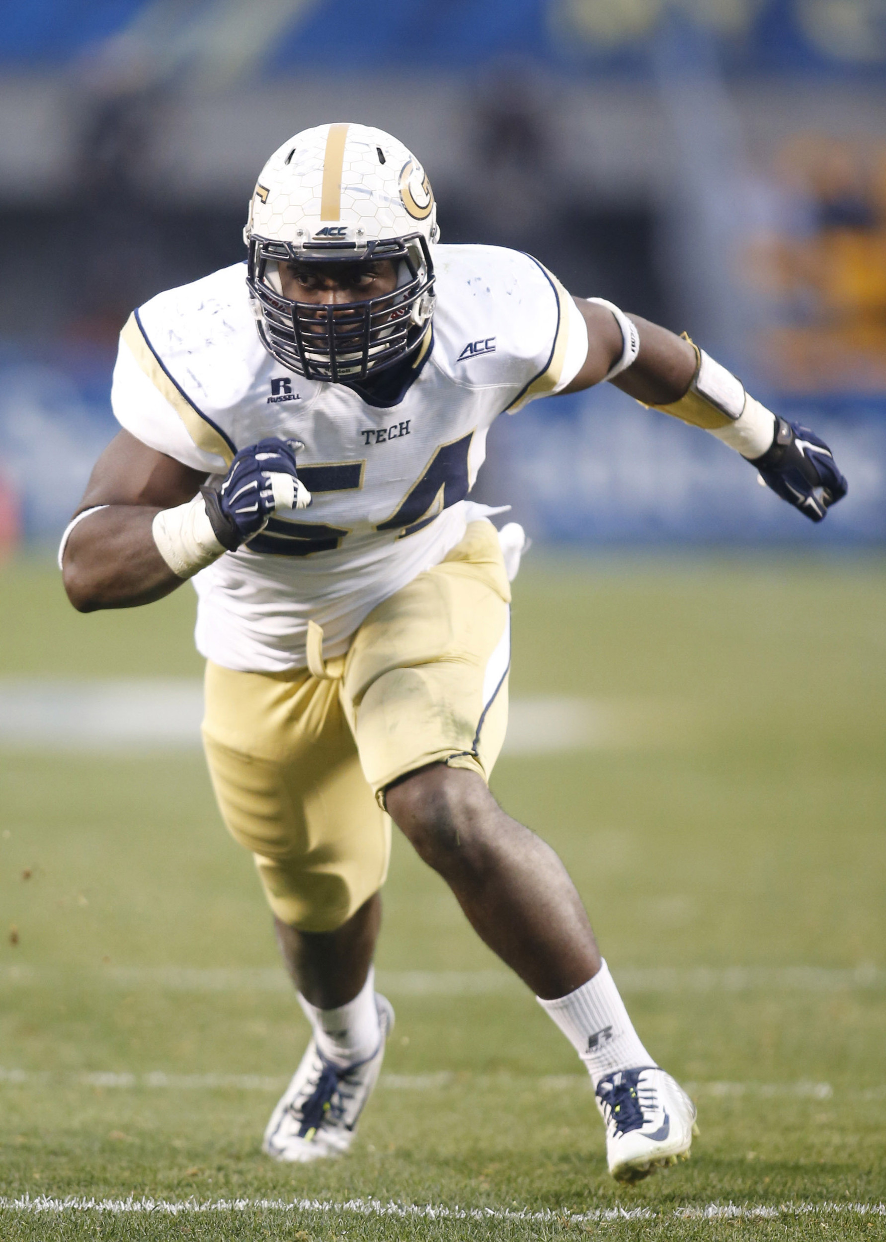Oct 25, 2014; Pittsburgh, PA, USA; Yellow Jackets linebacker Quayshawn Nealy (54) breaks off of the line of scrimmage during the fourth quarter. Charles LeClaire-USA TODAY Sports
