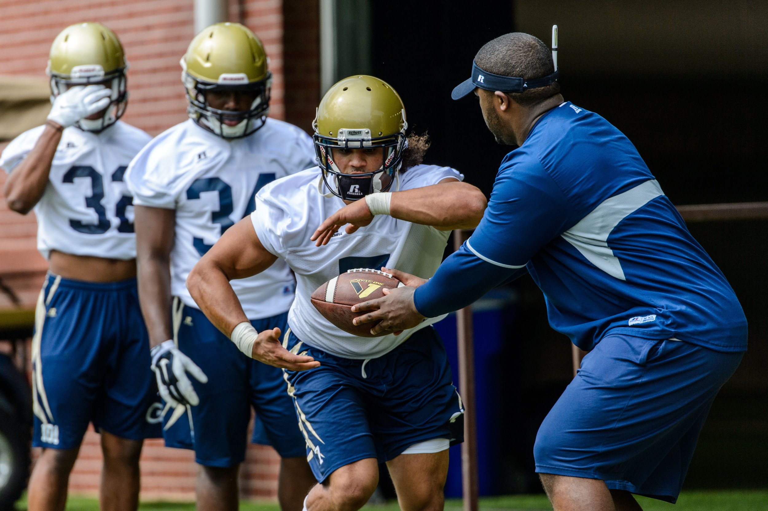 Patrick Skov (7), Graduate Assistant Coach Steven Sylvester
