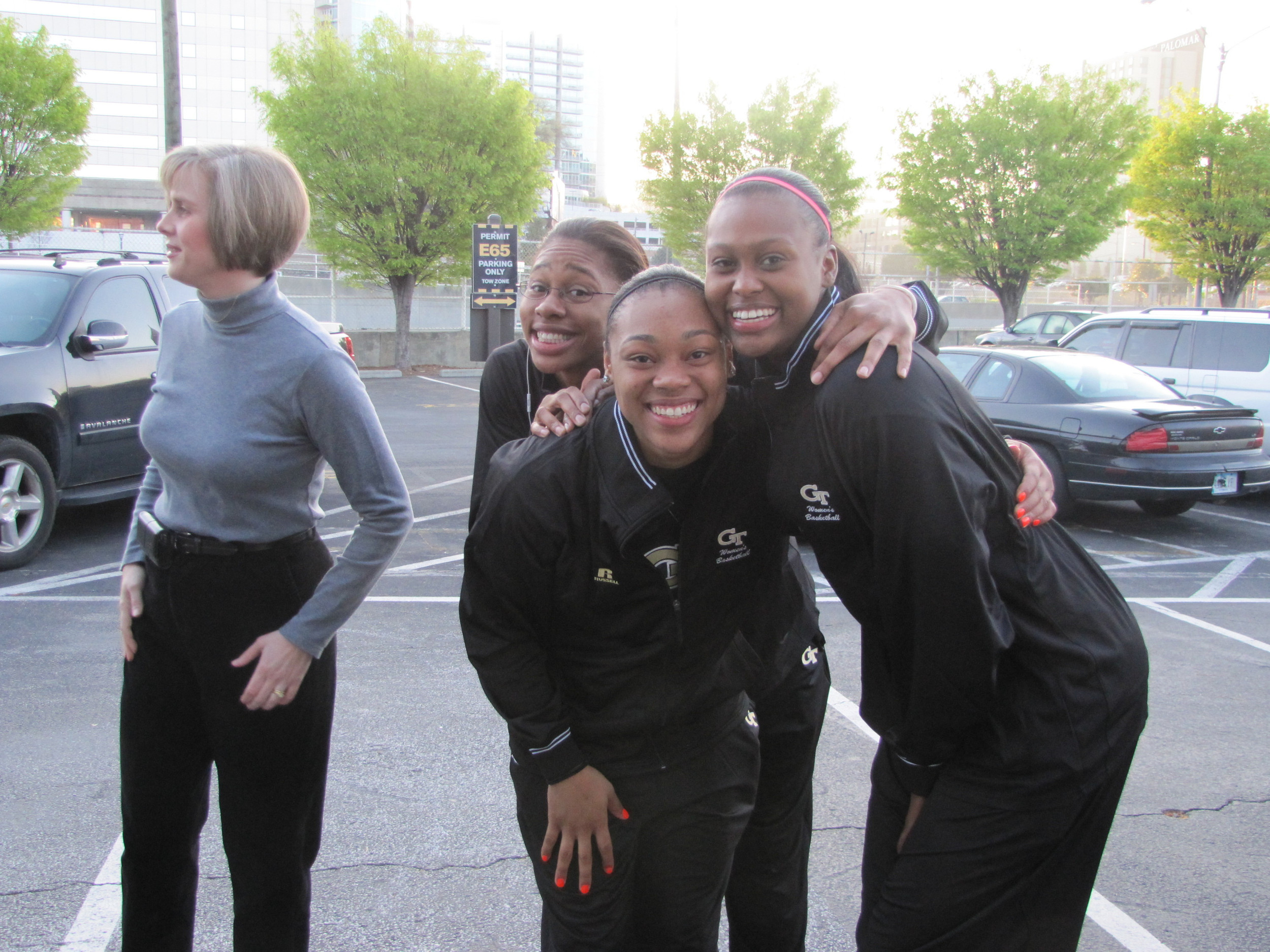 Alex Montgomery, Sharena Taylor and LaQuananisha Adams before getting on the bus to leave Atlanta