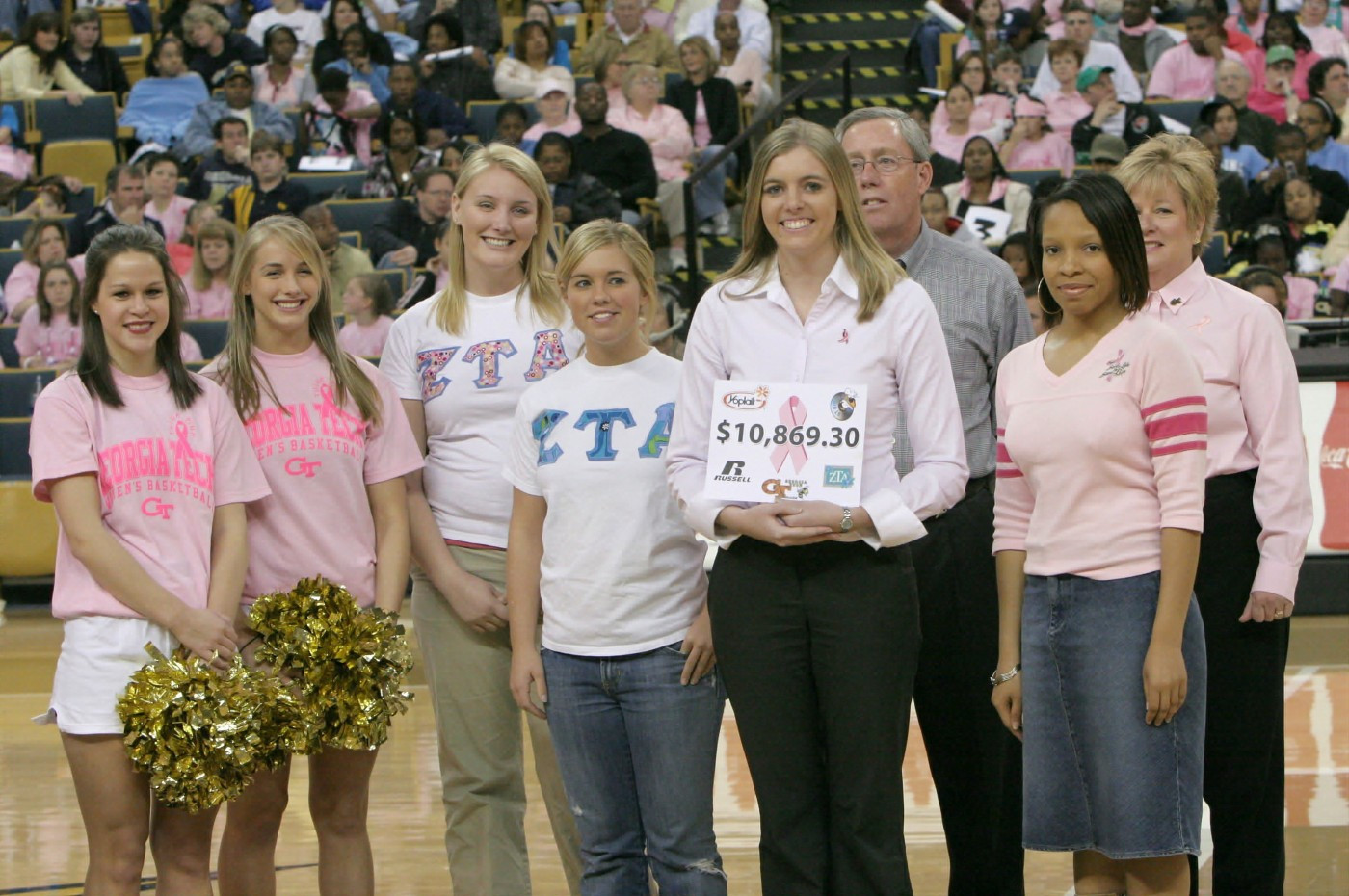 Georgia Tech and Zeta Tau Alpha Sorority present the Atlanta Susan G. Komen Foundation with a check