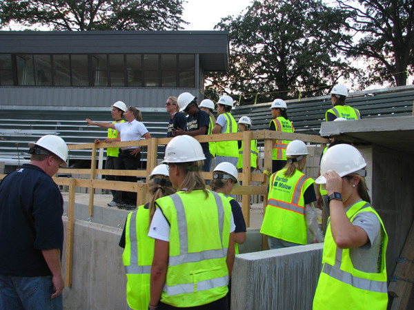 The team heads up to the main grandstand behind home plate.