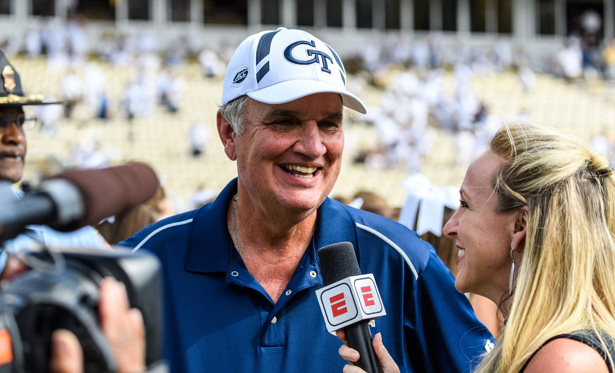 Coach Paul Johnson smiles during the postgame ESPN interview