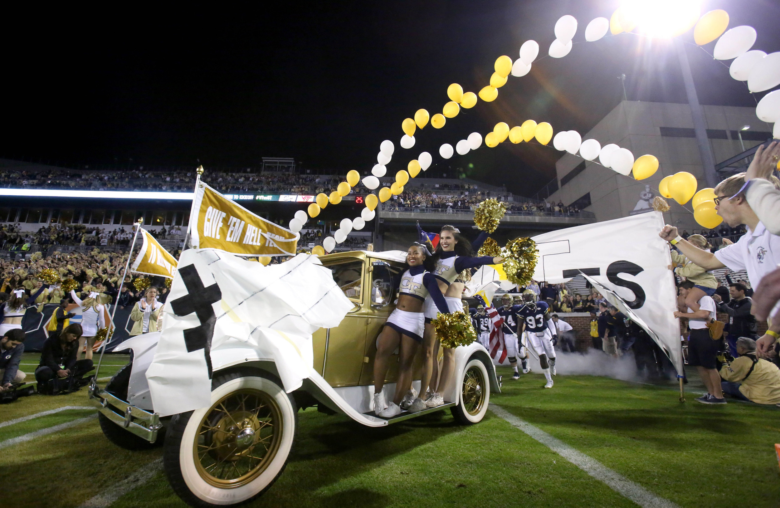 The Georgia Tech Yellow Jackets Ramblin' Wreck drives onto the field before the Jackets' game against the Virginia Tech Hokies (Jason Getz-USA TODAY Sports)