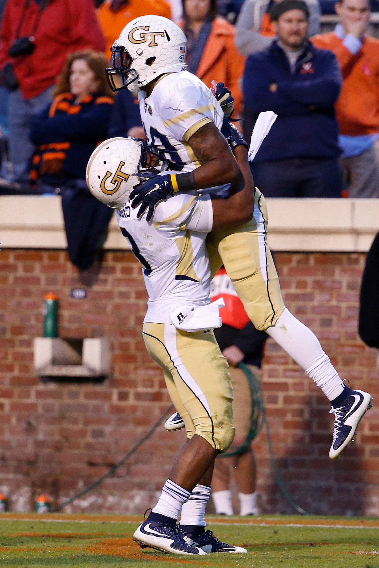 Clinton Lynch celebrates with running back Isiah Willis after scoring a touchdown. Amber Searls-USA TODAY Sports