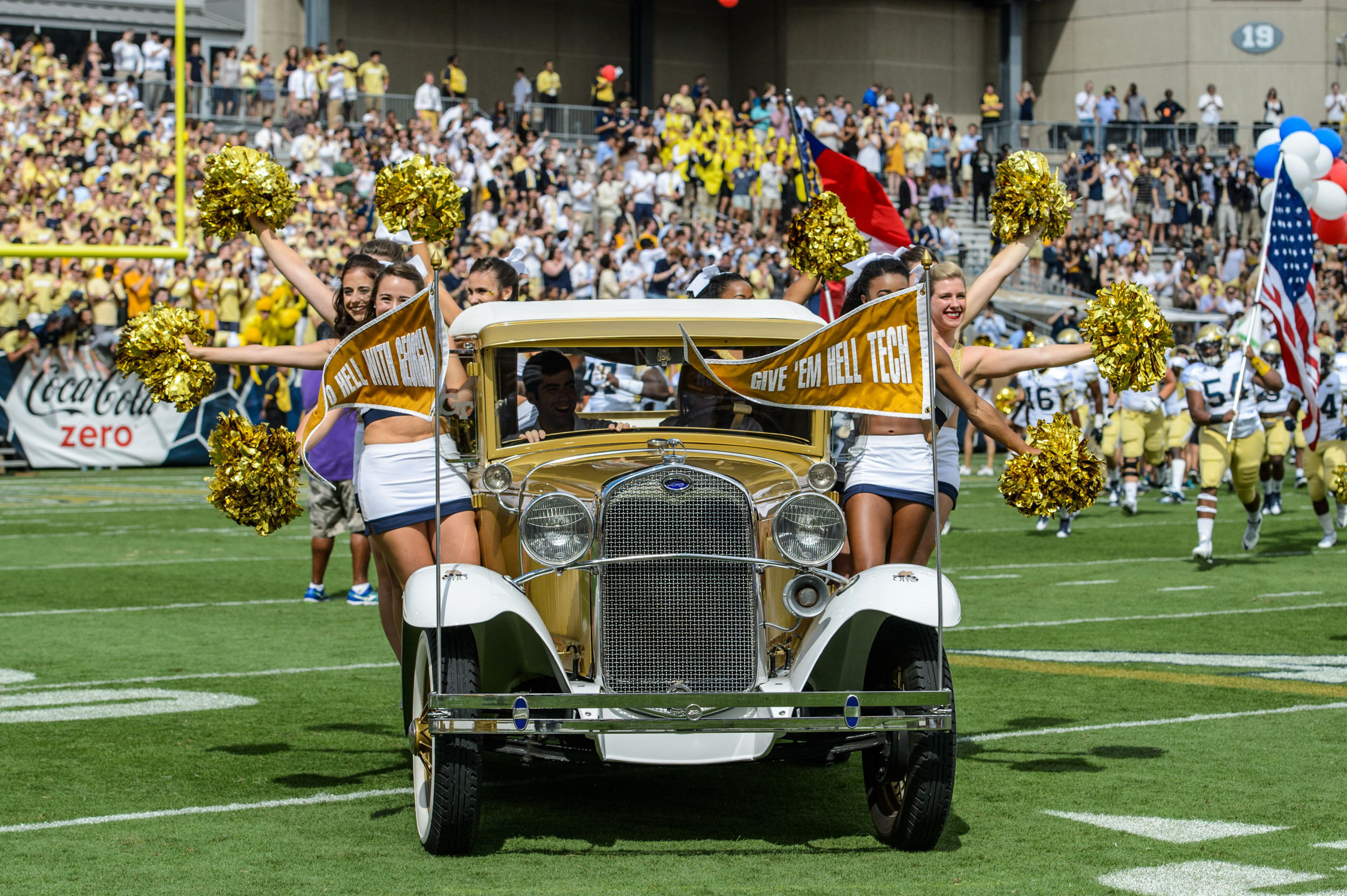 The Ramblin' Reck leads the team onto the field