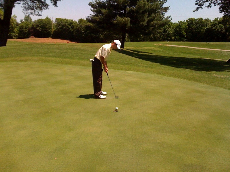 David Dragoo rolls in a putt during Monday's practice round at Indian Hills Country Club in Bowling Green.