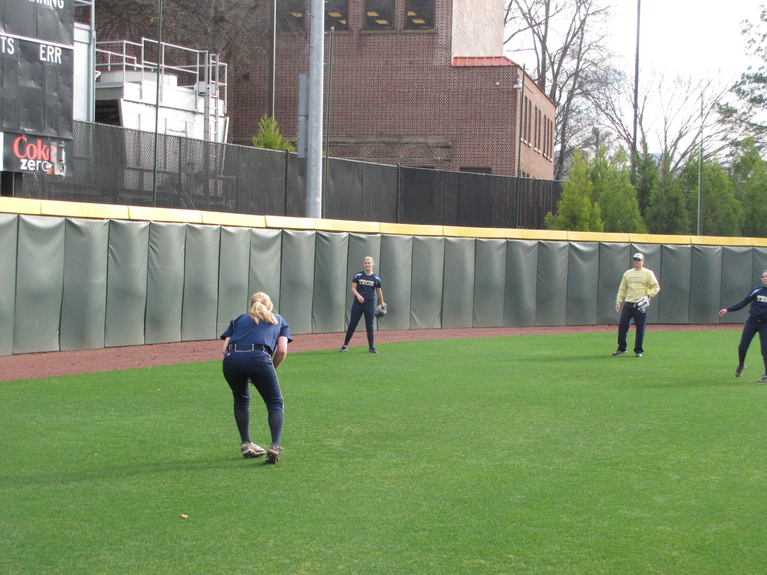 The Jackets do some throwing drills in the outfield