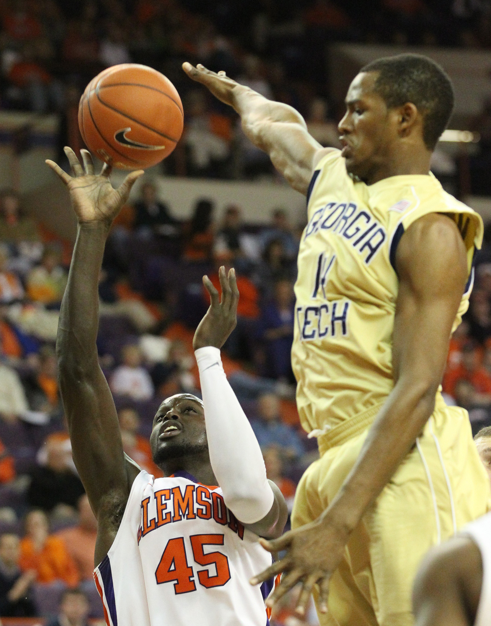Georgia Tech guard Jason Morris tries to block a shot by Clemson foward Jerai Grant.