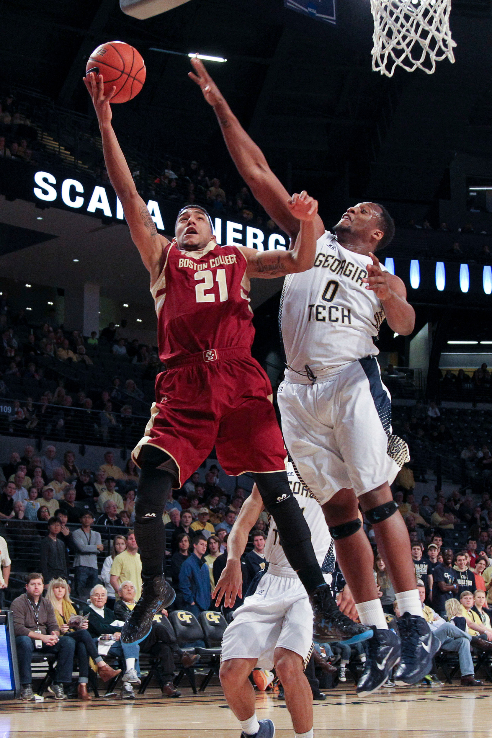 Jan 25, 2015; Atlanta, GA, USA; Boston College Eagles guard Olivier Hanlan (21) shoots the ball over Georgia Tech Yellow Jackets forward Charles Mitchell (0) in the first half at McCamish Pavilion. Mandatory Credit: Brett Davis-USA TODAY Sports
