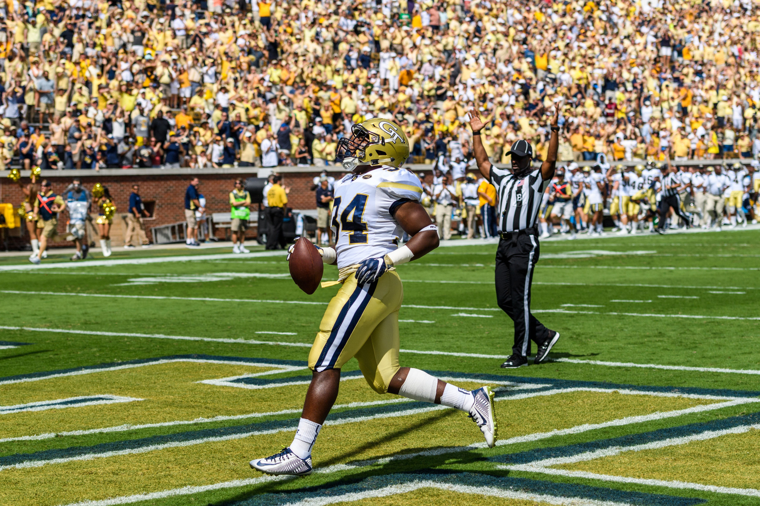Marcus Marshall (34) strolls into the end zone with a touchdown catch on the first play of the game versus Vanderbilt.