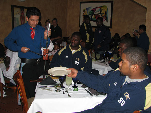 Yellow Jackets eat dinner at Fire of Brazil.