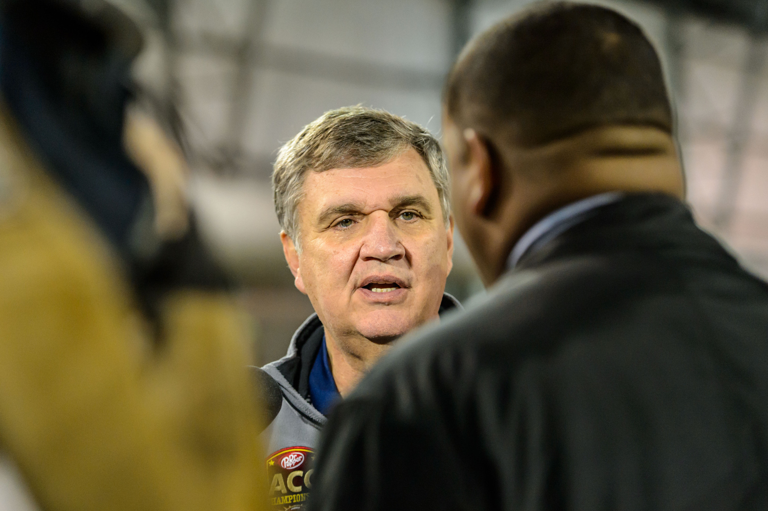 Coach Paul Johnson talks to the media
