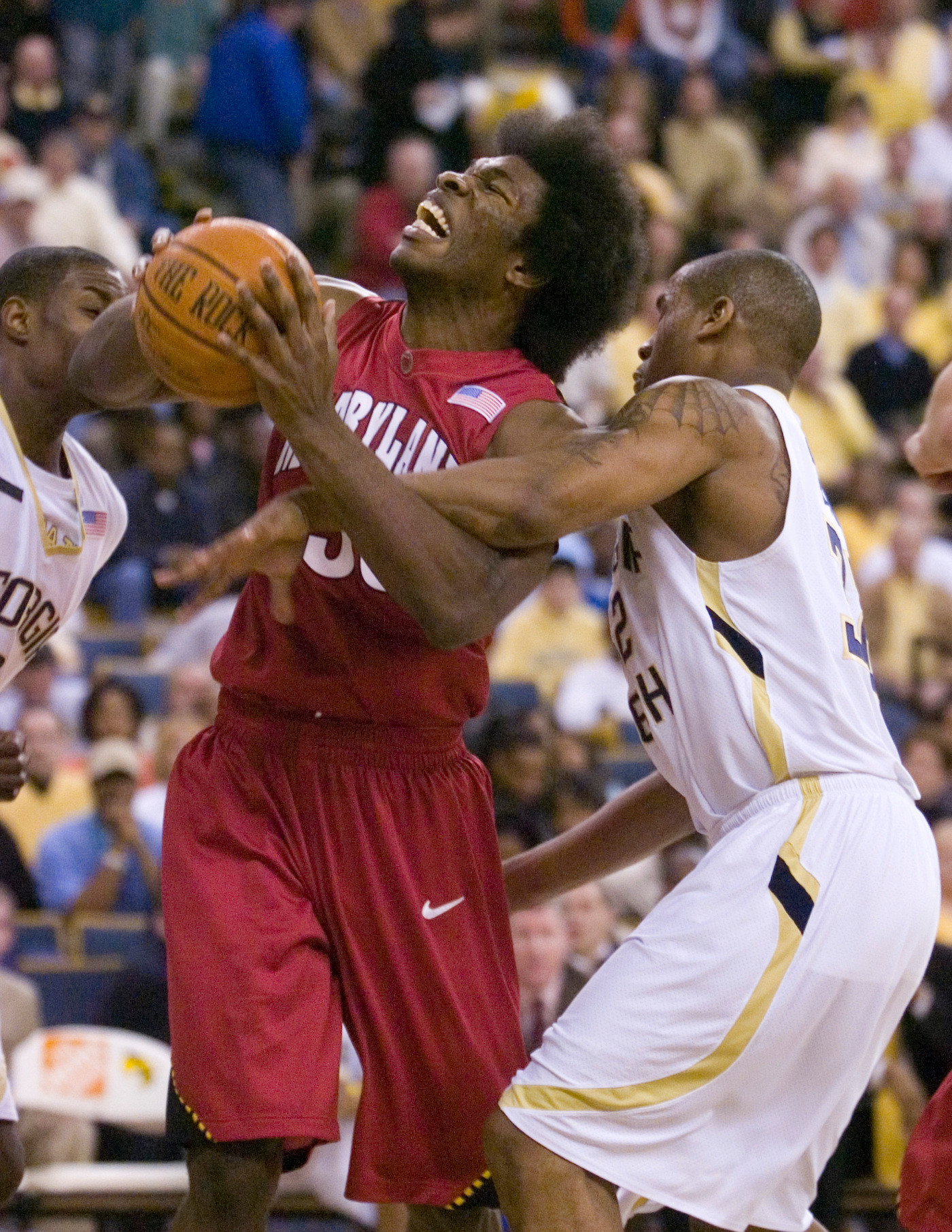 Maryland's Bambale Osby is fouled by Jeremis Smith during the first half Saturday in Atlanta. (AP Photo/Erik S. Lesser)