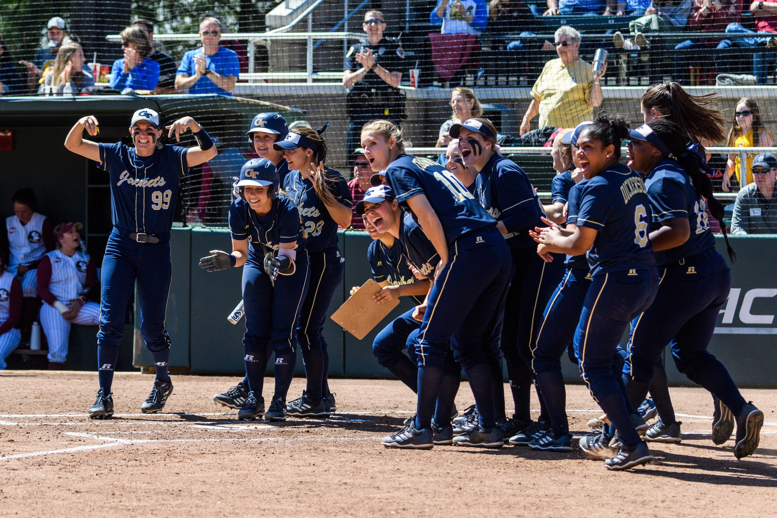The team awaits Crosby Huckabay at the plate