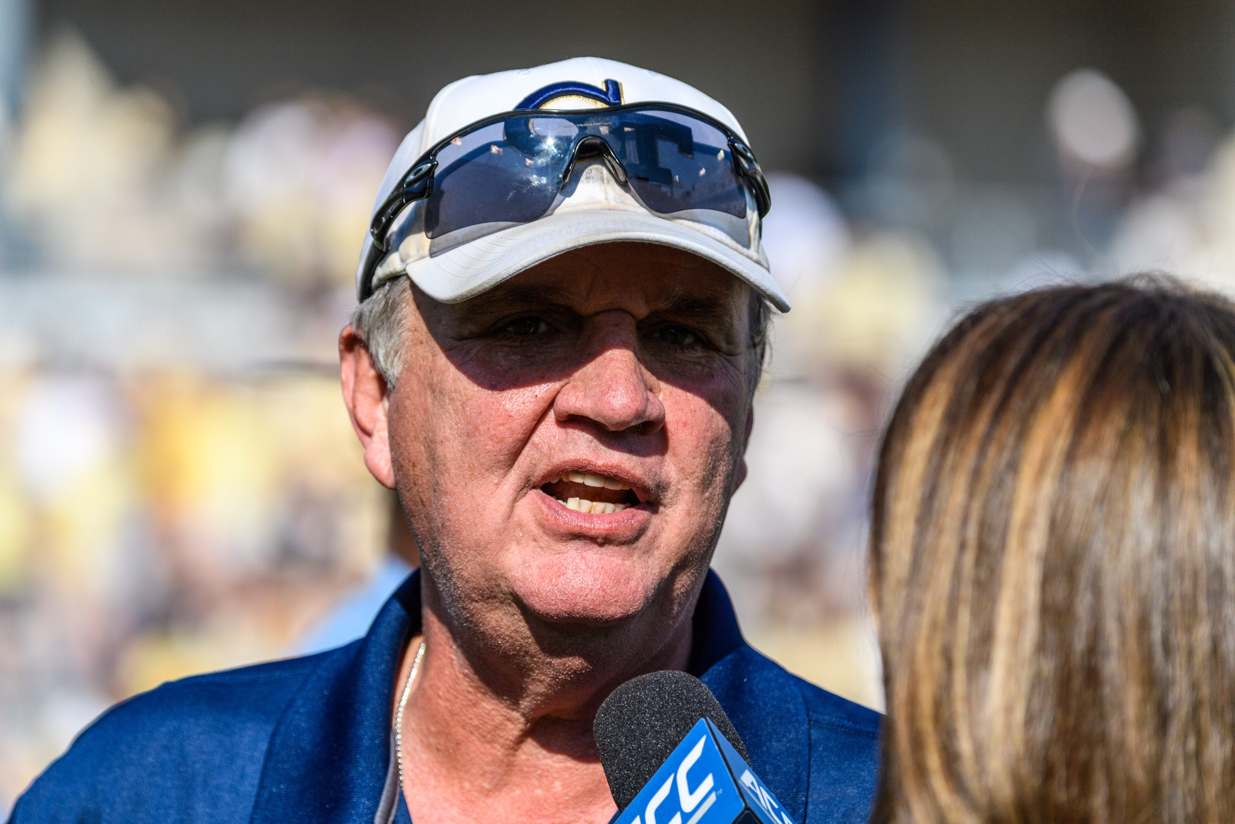 Coach Paul Johnson is interviewed after the win