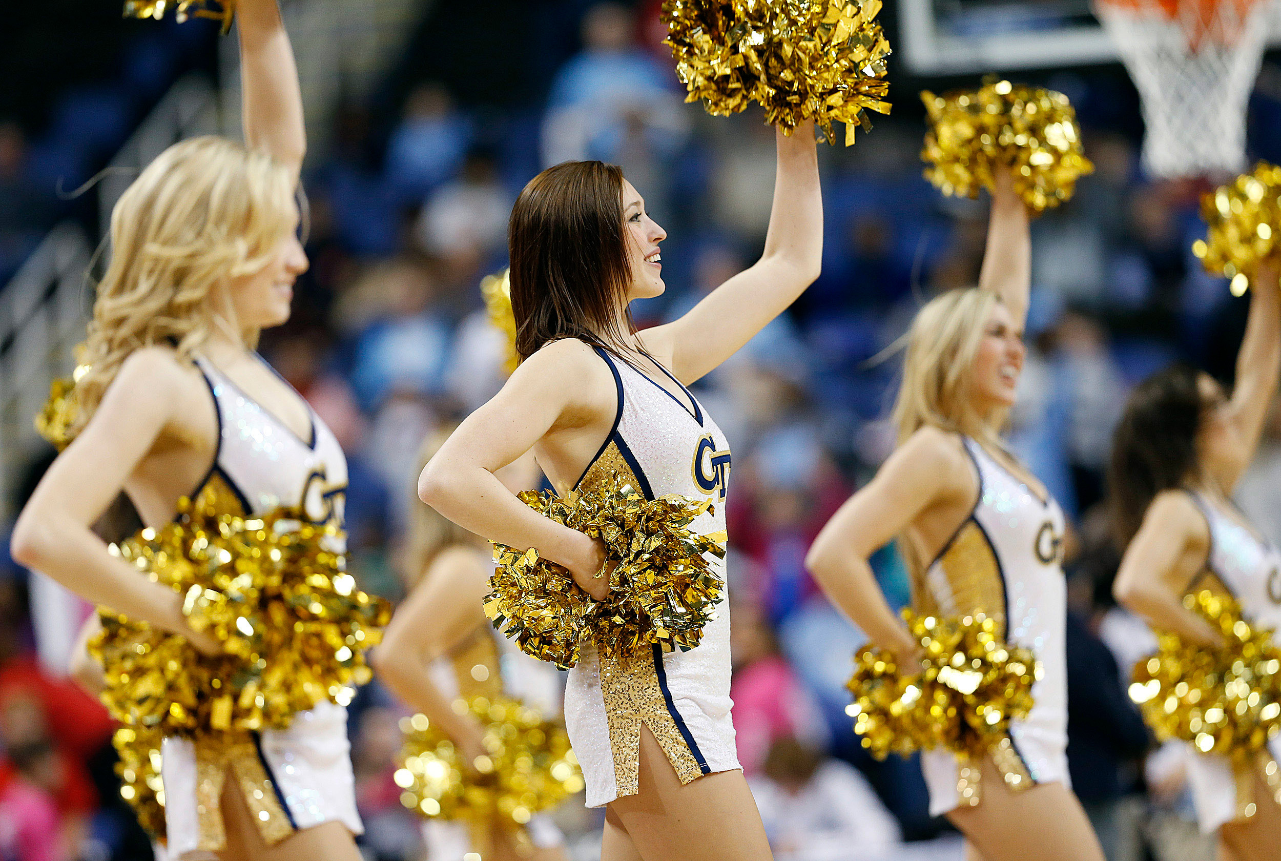 Mar 7, 2014; Greensboro, NC, USA; Georgia Tech Yellow Jackets cheerleaders perform during a timeout against the Duke Blue Devils at Greensboro Coliseum. Mandatory Credit: Ellen Ozier-USA TODAY Sports