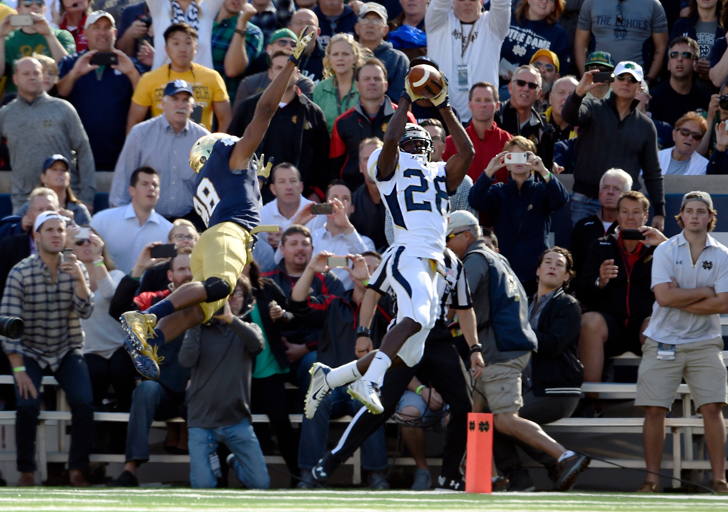 Defensive back D.J. White (28) intercepts the ball (RVR Photos-USA TODAY Sports)