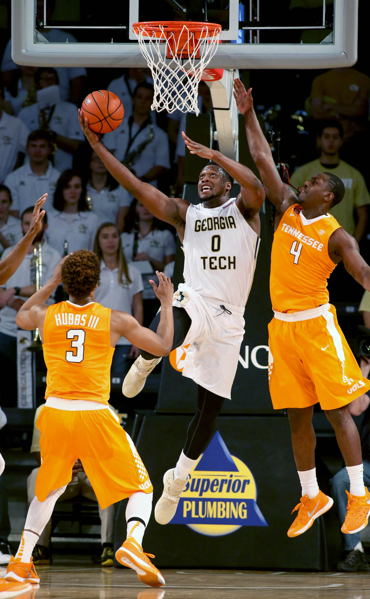 Georgia Tech Yellow Jackets forward Charles Mitchell (0) attempts a basket against Tennessee Volunteers guard Robert Hubbs III (3) and forward Armani Moore (4) in the first half of their game at McCamish Pavilion.