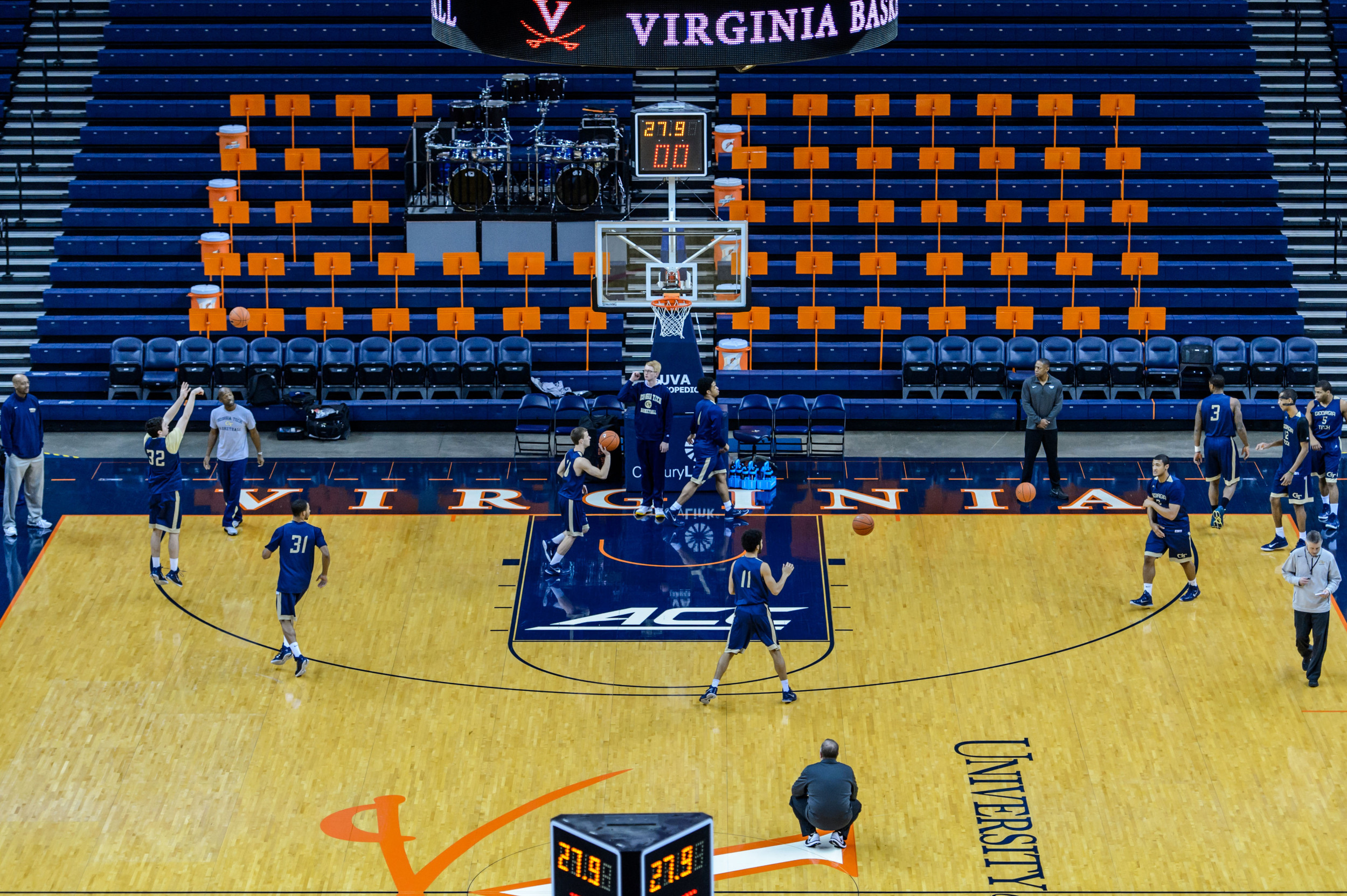 The Yellow Jackets work on various basketball skills during shoot around.